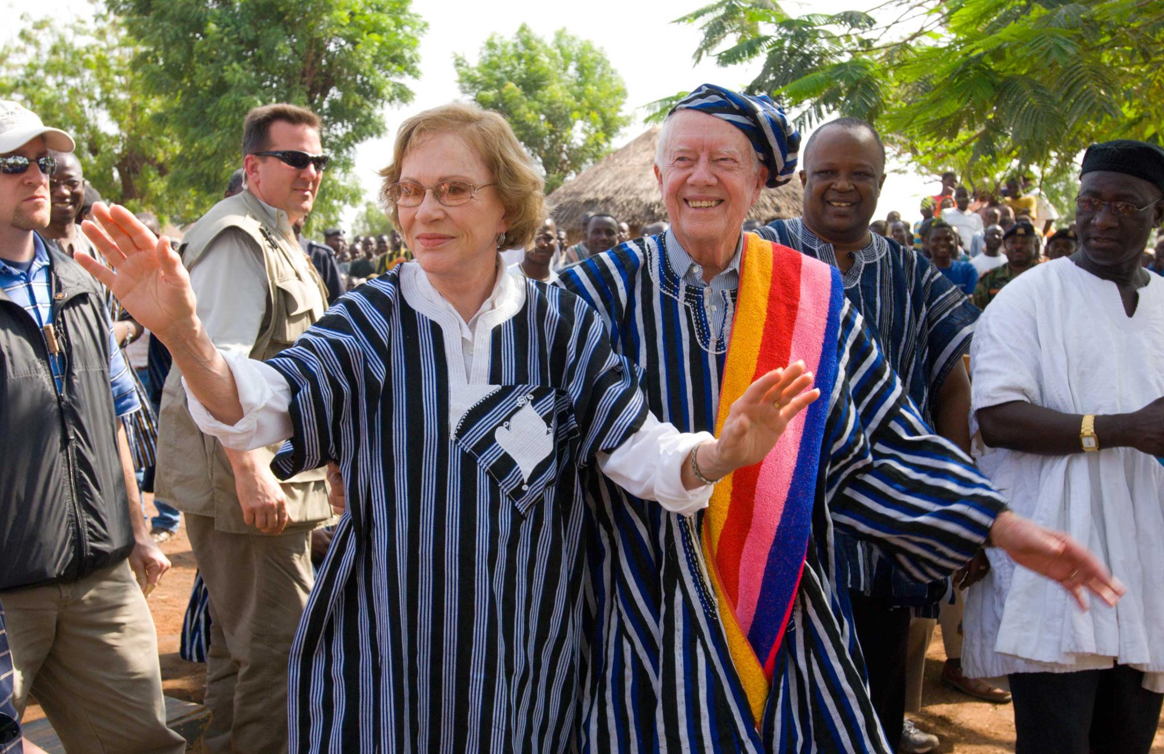February 8, 2007. Tingoli Village, Northern Province, Ghana. President Jimmy Carter and his wife Rosalynn are honored by the Dagumba people of Tingoli with a gift of traditional attire, which they wear with joy.