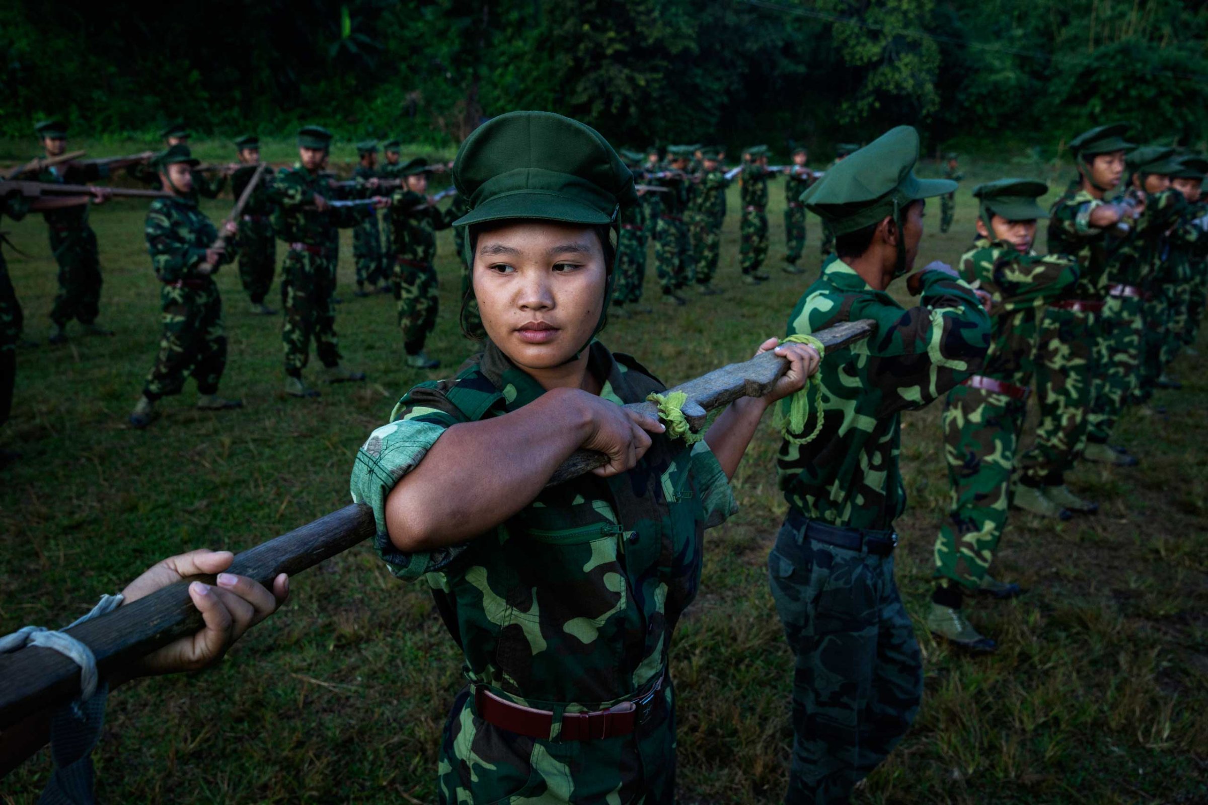 High school and university students receive drill instructions in Laiza, which lies in a Kachin Independence Army–controlled part of Kachin state, in Burma, on Nov. 10, 2014.