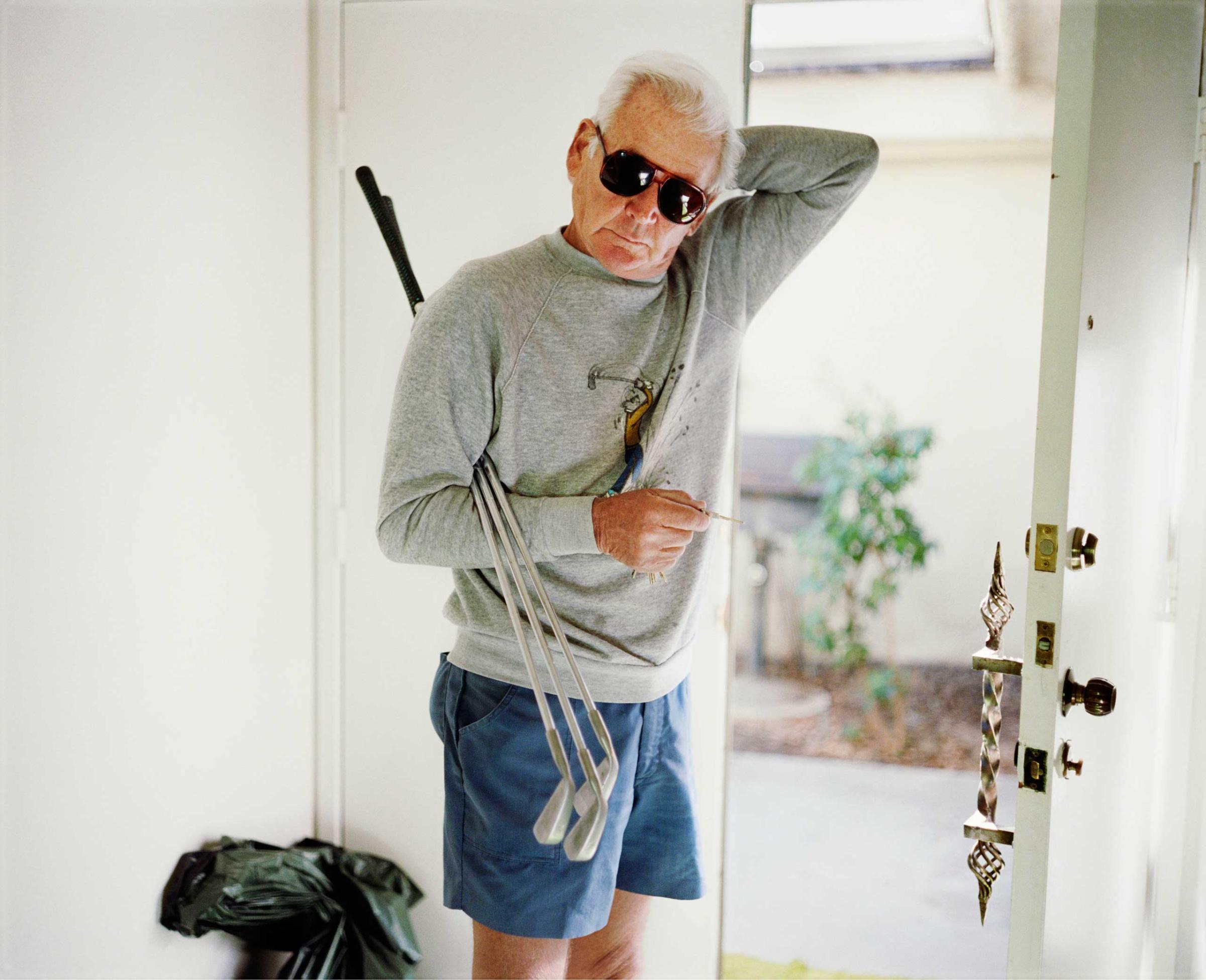 Dad with Golf Clubs, 1987, from the series Pictures From Home