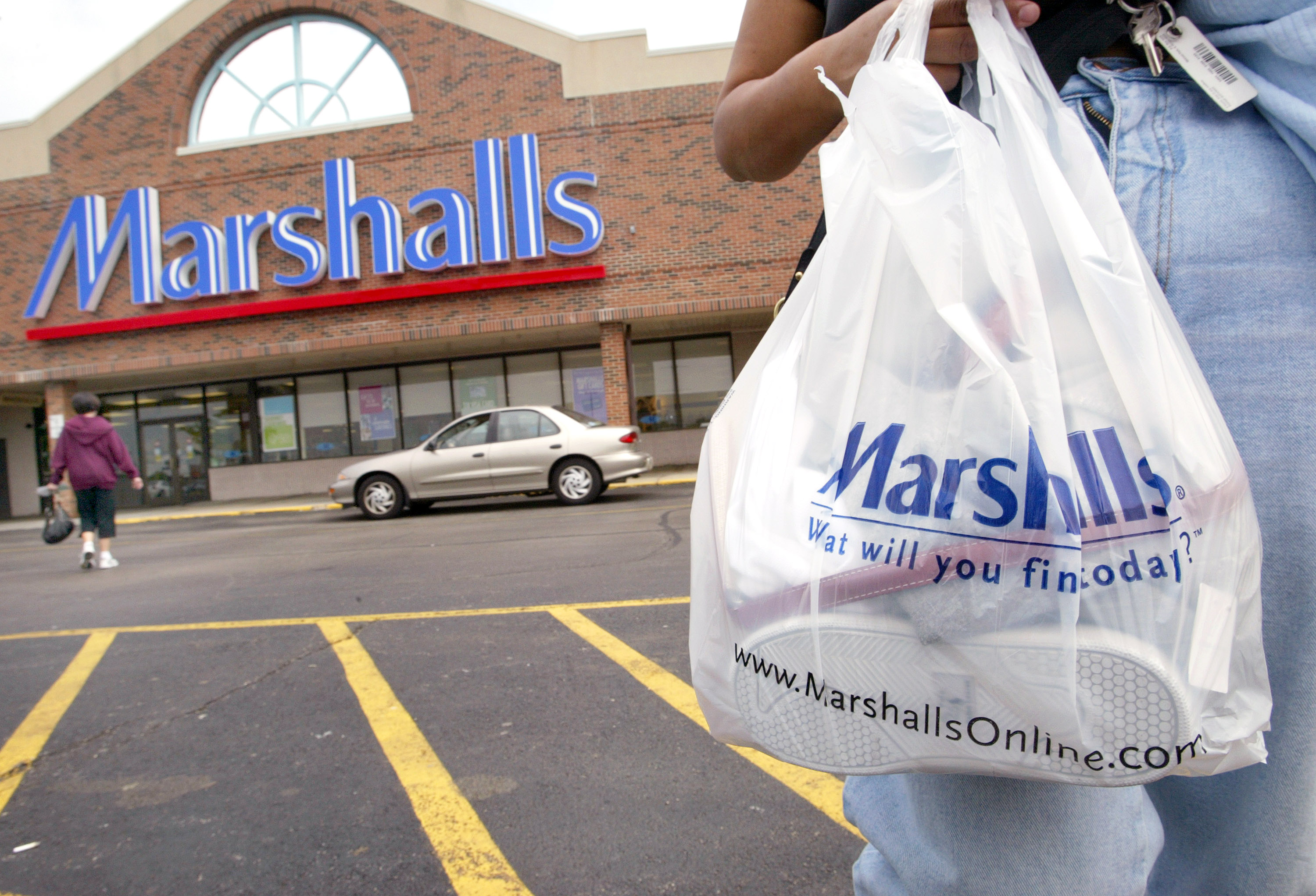 MOUNT PROSPECT - MAY 19:  A shopper with her purchases walks to her car outside a Marshalls store May 19, 2004 in Mount Prospect, Illinois. T.J. Maxx' and Marshalls' parent company TJX Cos. posted a 48 percent first-quarter rise in profit. Sales alone from the T.J. Maxx and Marshalls stores rose 12.6 percent from last year.  (Photo by Tim Boyle/Getty Images) (Tim Boyle&amp;mdash;Getty Images)
