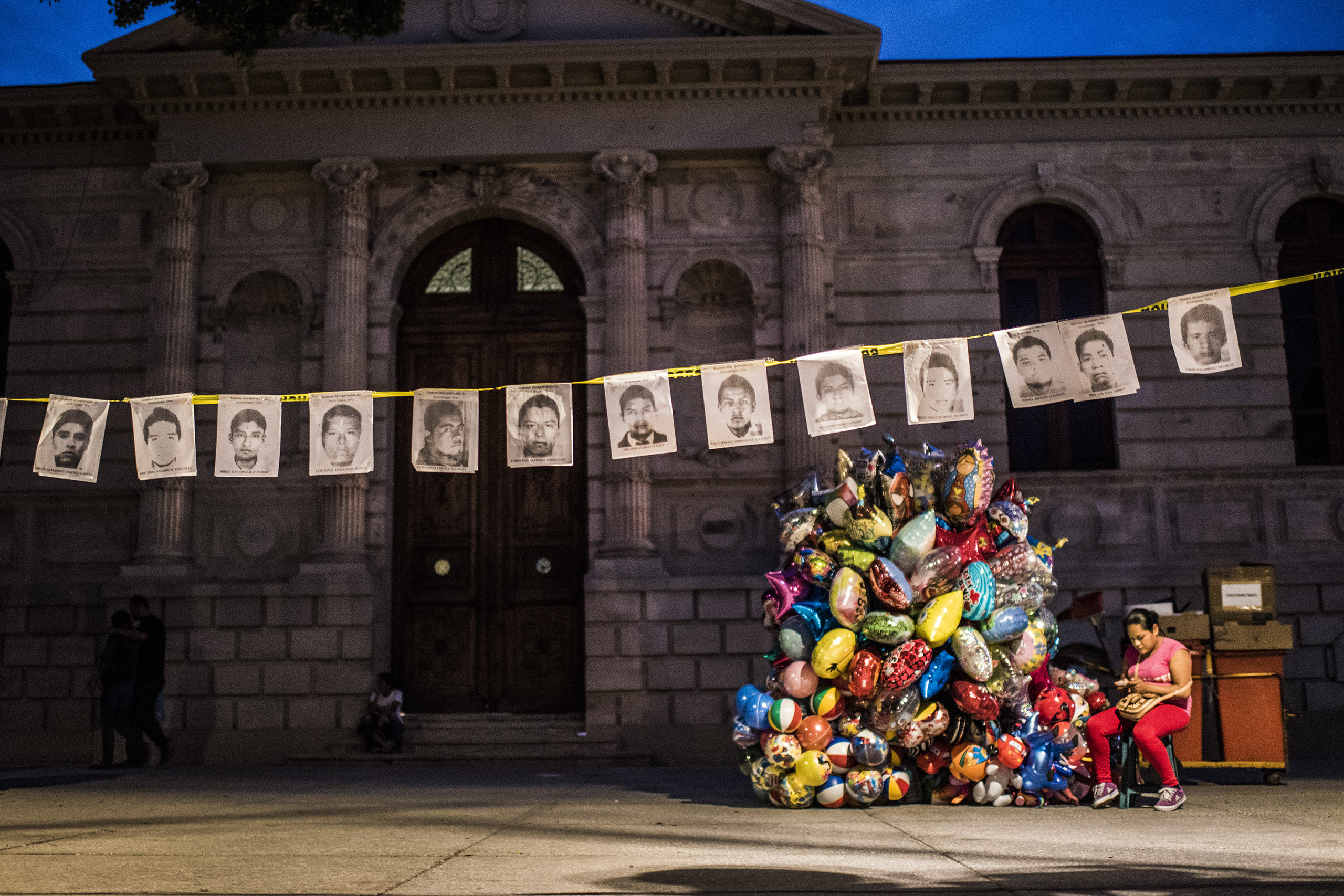 Grim memorial Portraits of the missing students hang in the main square of Chilpancingo, the capital of Guerrero state. (Photograph by Sebastian Liste—NOOR for TIME)