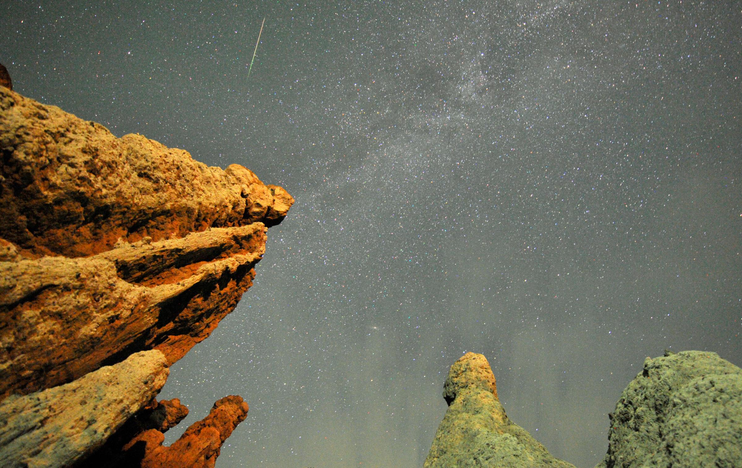 A Perseid meteor streaks past stars in the night sky over the village of Kuklici, known for its hundreds of naturally formed stones, near Kratovo, east of Skopje, on Aug. 13, 2012.