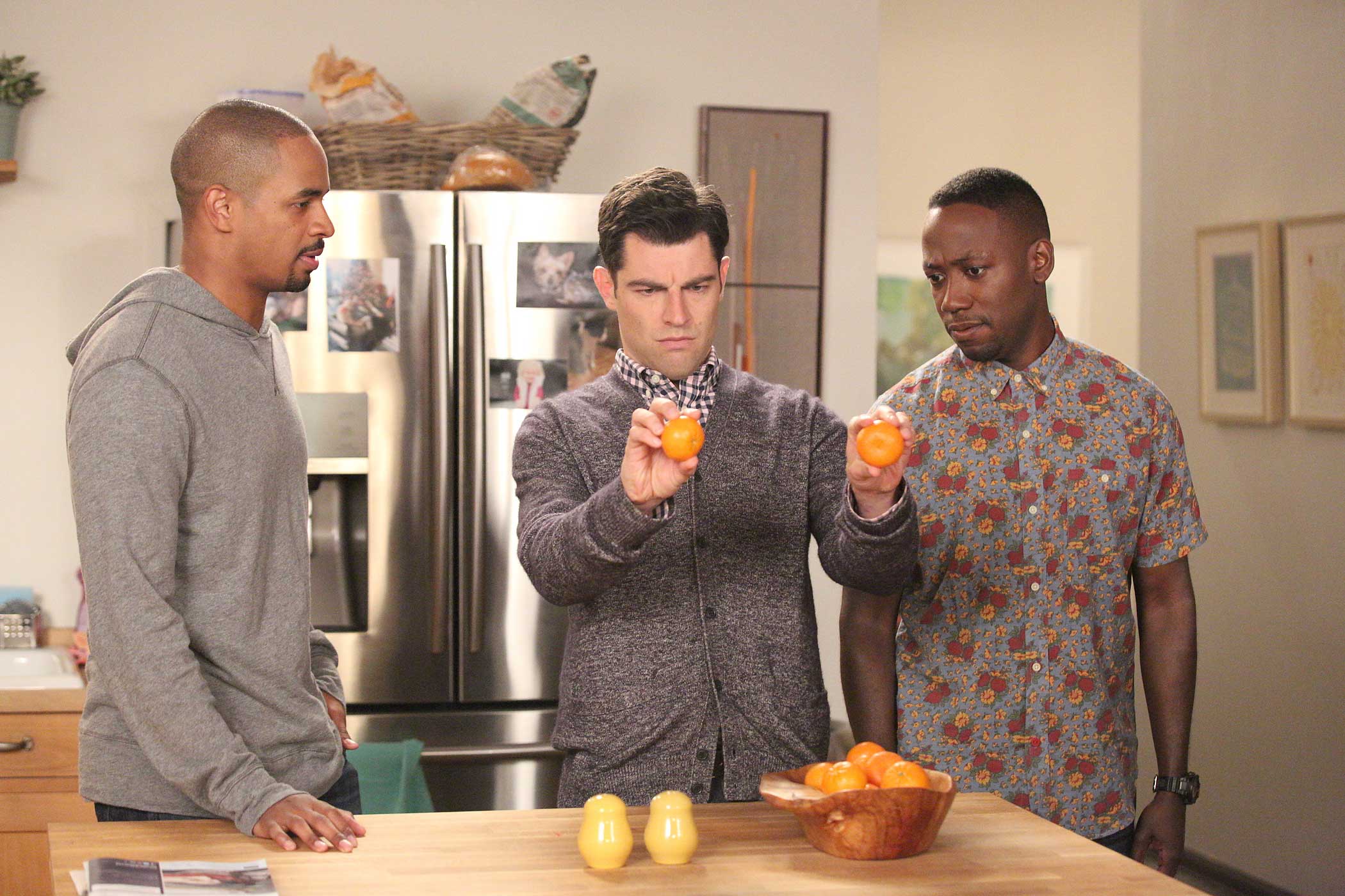 NEW GIRL:   Schmidt (Max Greenfield, C), Coach (Damon Wayans, Jr., L) and Winston (Lamorne Morris, R) visit their neighbors in the "Goldmine" episode of NEW GIRL airing Tuesday, Nov. 11 (9:00-9:30 PM ET/PT) on FOX.  ©2014 Fox Broadcasting Co.  Cr:  Adam Taylor/FOX