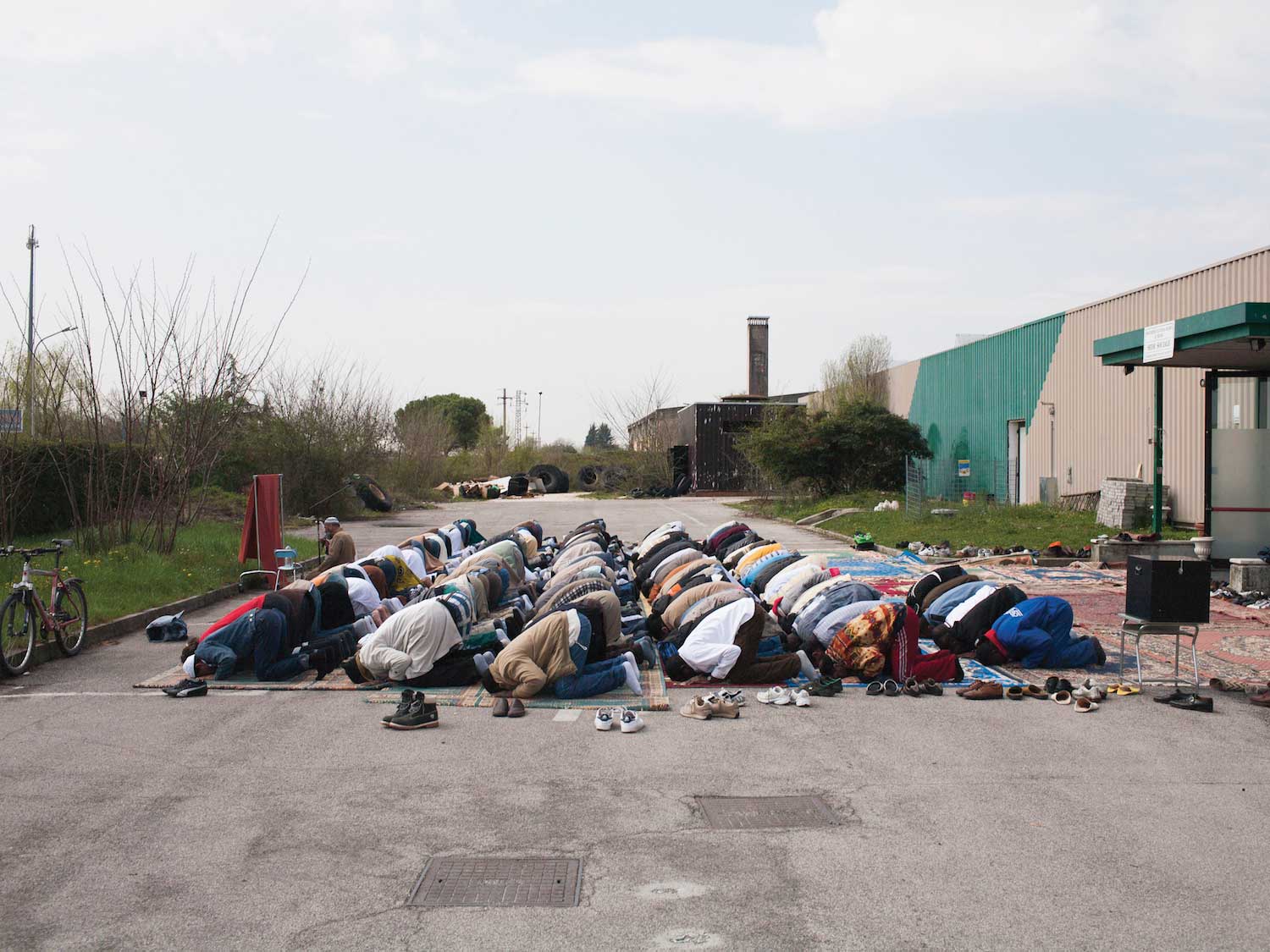 A parking lot used as a makeshift place of worship for Muslims in the Province of Treviso, Italy.