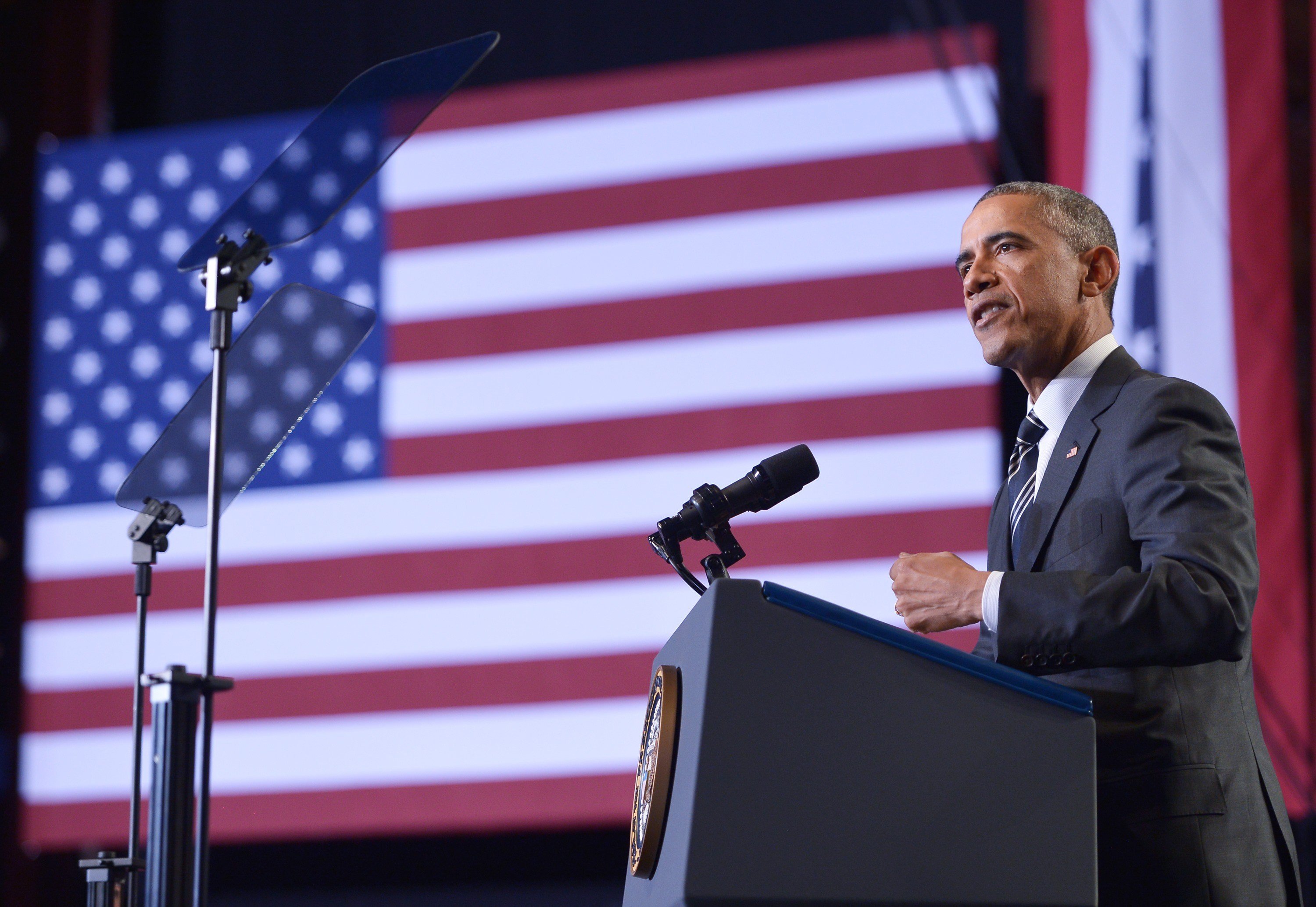 US President Barack Obama speaks on ferguson and immigration reform at the Copernicus Community Center on Nov. 25, 2014 in Chicago. (Mandel Ngan—AFP/Getty Images)
