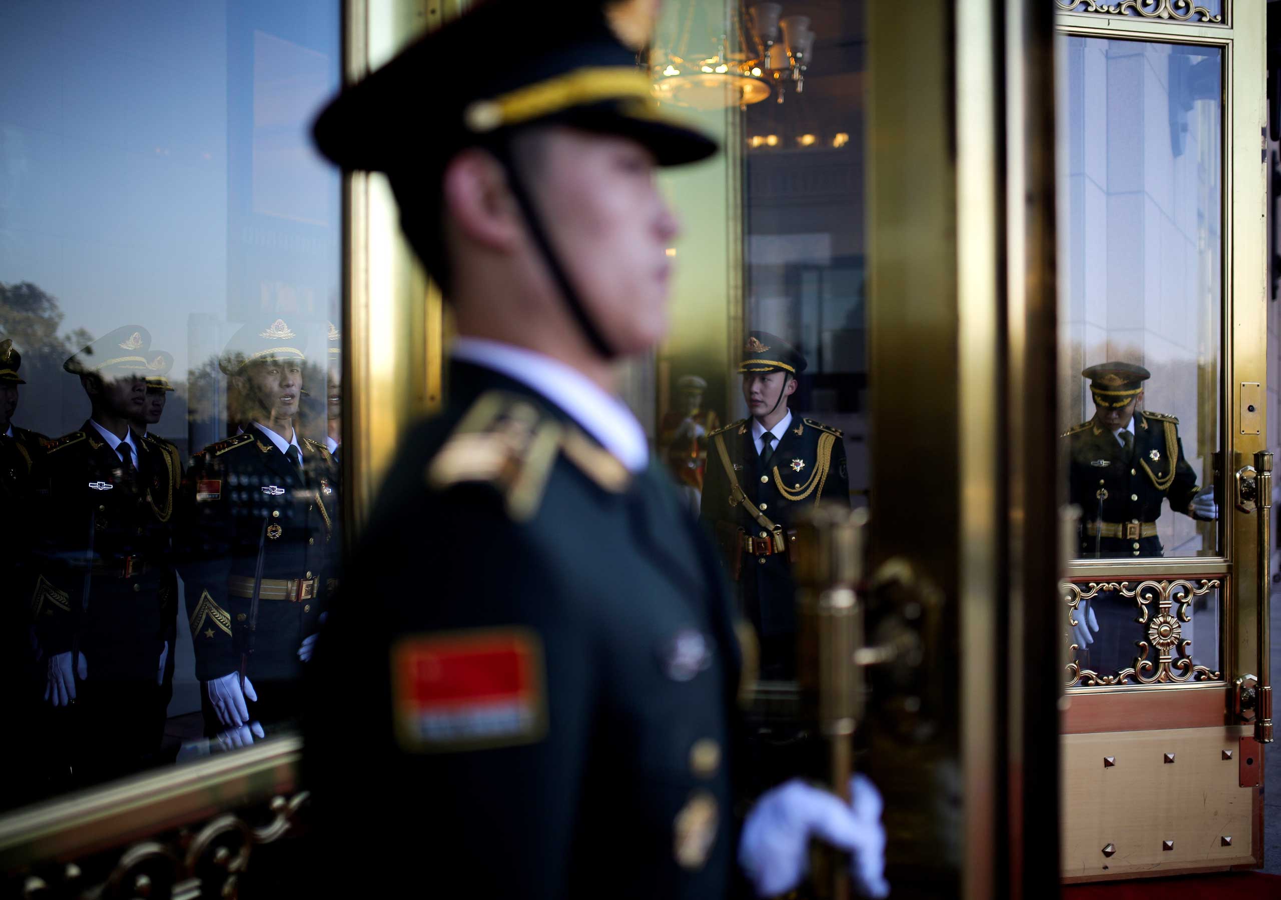 Nov. 13, 2014. Chinese guards of honor prepare at the main entrance of the Great Hall of the People in Beijing for a welcome ceremony held by Chinese President Xi Jinping for visiting Mexican President Enrique Pena Nieto.