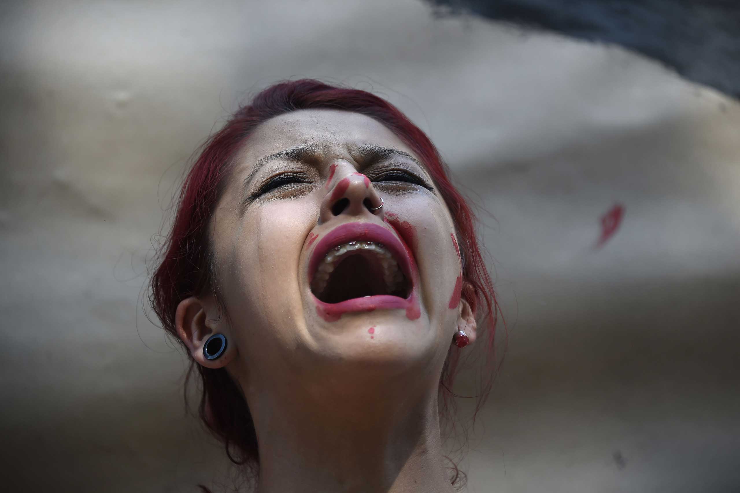 Nov. 5, 2014. A woman shouts during a demonstration blocking the attorney's office in Mexico City to protest the Mexican government about the 43 missing students.