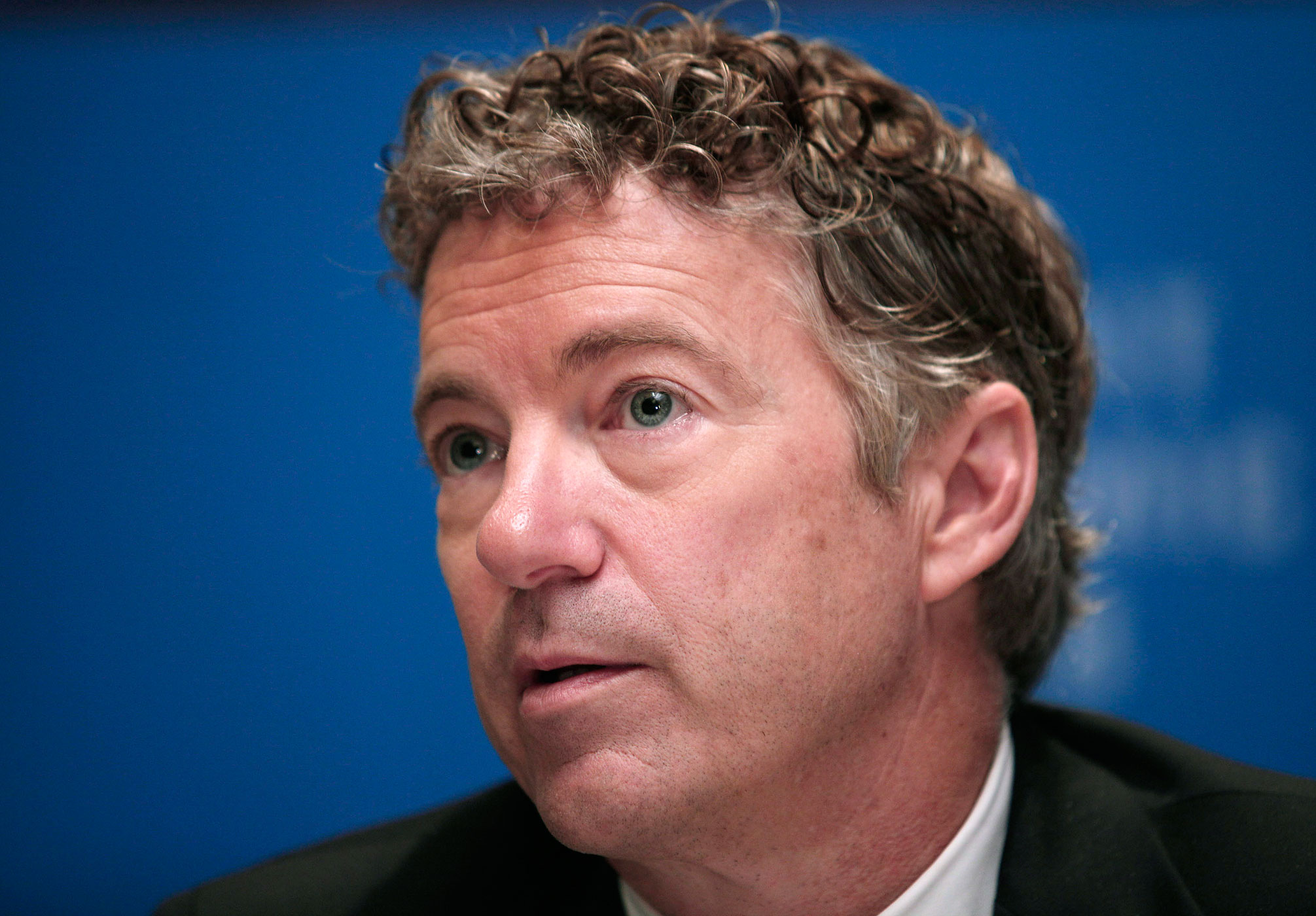 Sen. Rand Paul speaks with the news media after delivering a speech at the Detroit Economic Club on Dec. 6, 2013 in Detroit, Michigan. (Bill Pugliano—Getty Images)