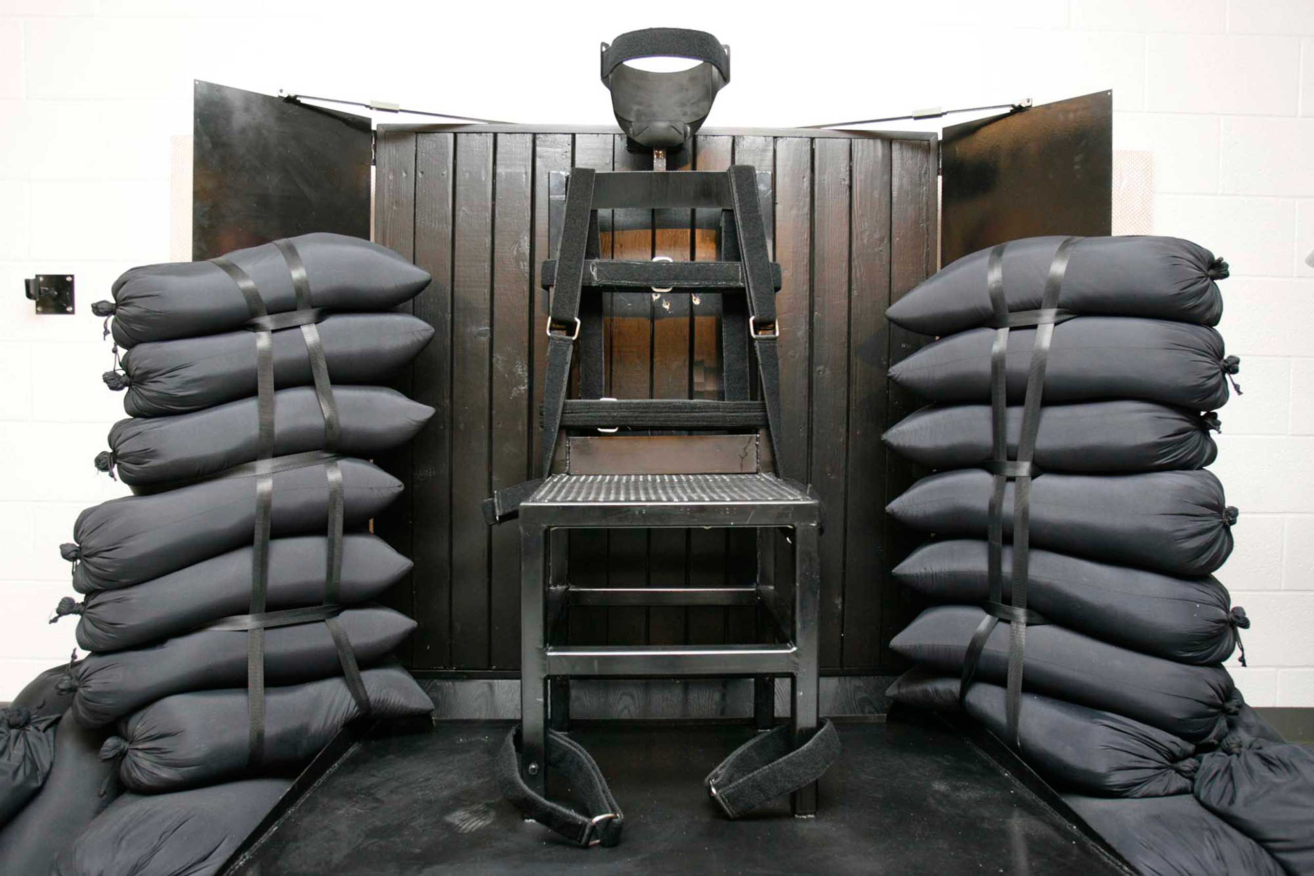 The execution chamber at the Utah State Prison after Ronnie Lee Gardner was executed by firing squad, with visible bullet holes, on June 18, 2010 in Draper, Utah. (Trent Nelson—AP)