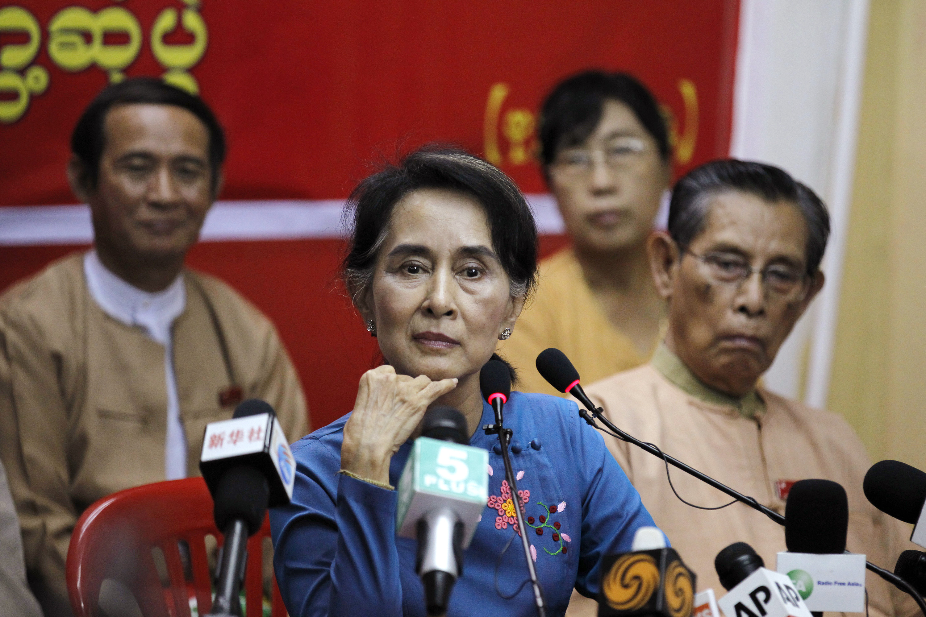 Myanmar's pro-democracy leader Aung San Suu Kyi listens as reporter asks her a question during a news conference at the National League for Democracy party head office in Rangoon on Nov. 5, 2014 (Soe Zeya Tun—Reuters)