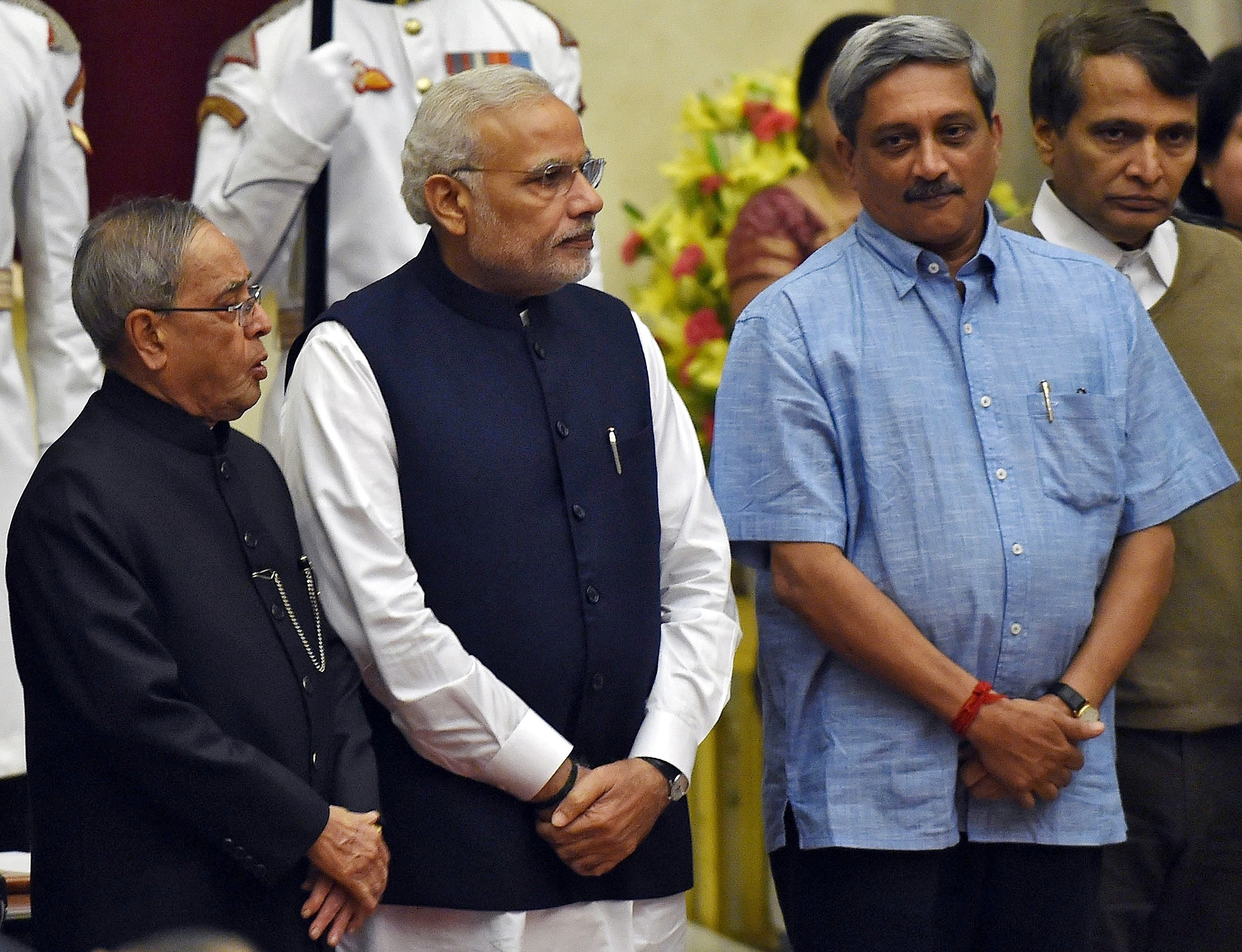 India's President Mukherjee, PM Modi, new cabinet ministers Manohar Parrikar and Suresh Prabhu pose after a swearing-in ceremony in New Delhi