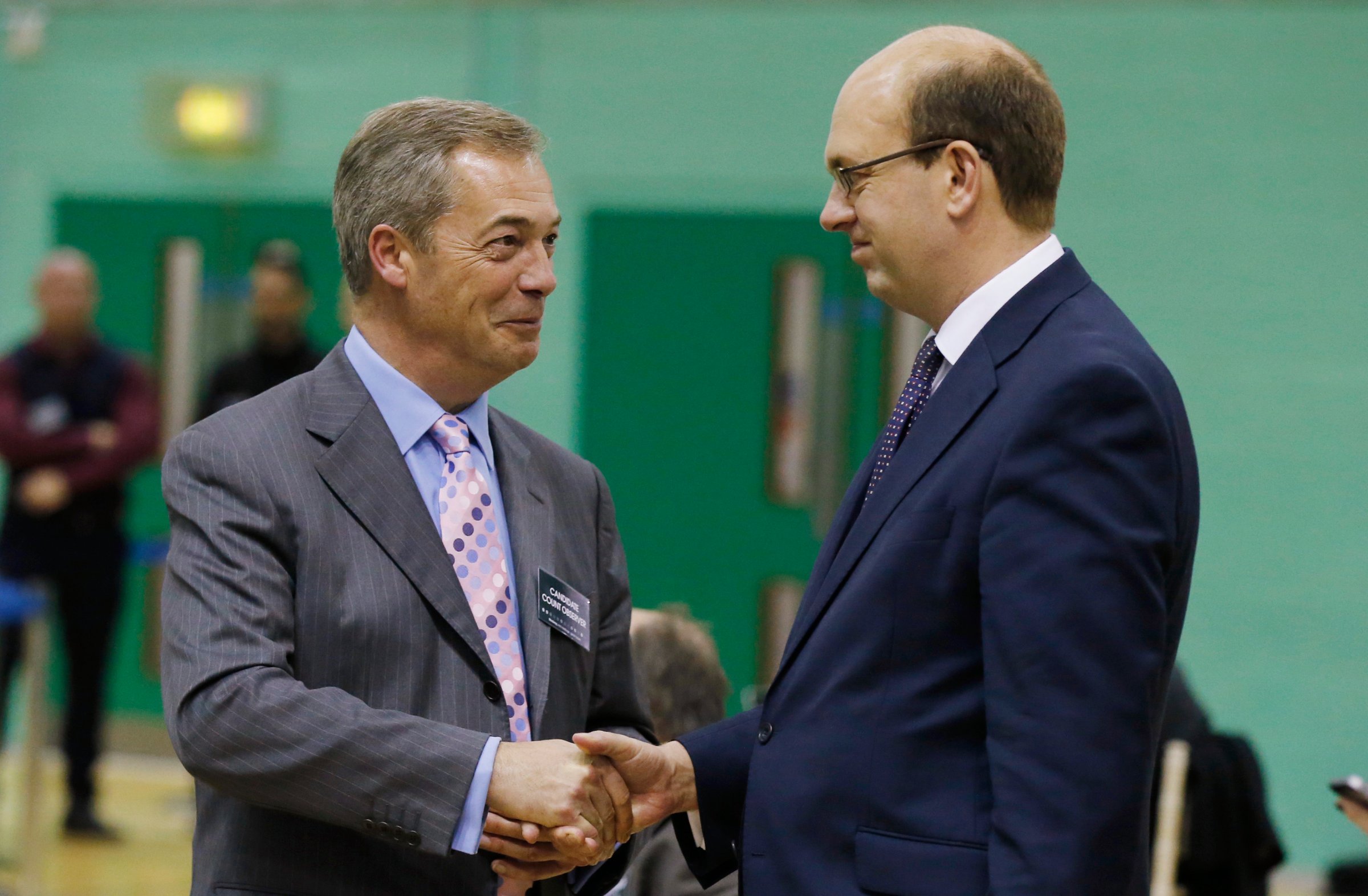 Nigel Farage, leader of UKIP, shakes hands with Mark Reckless in Gillingham