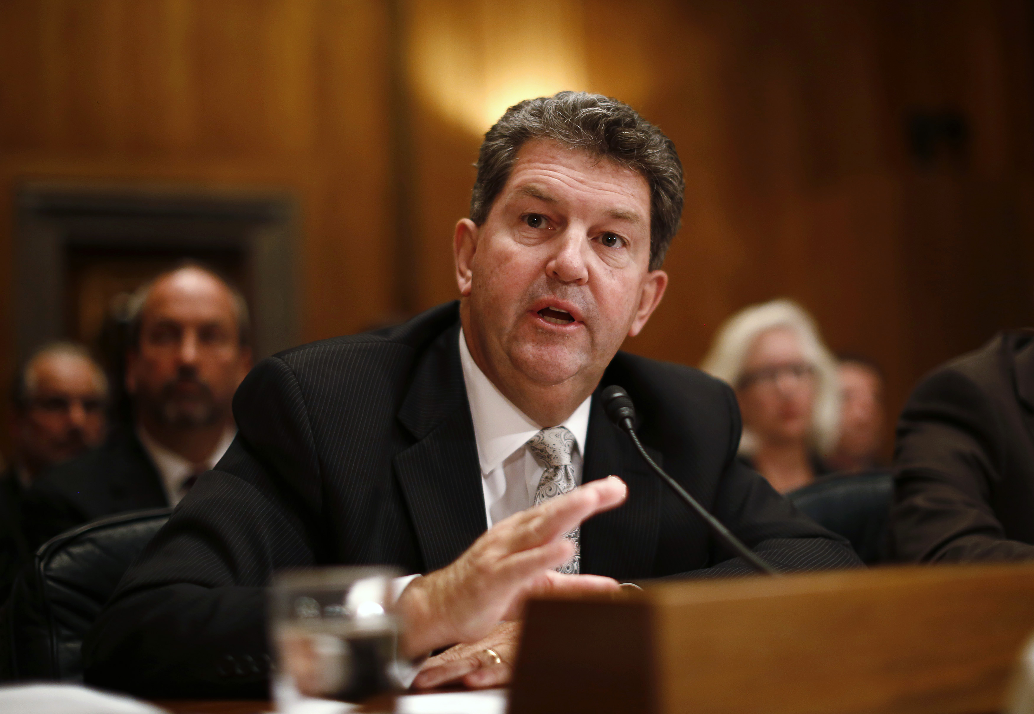 U.S. Postmaster General Donahoe speaks at a hearing on reforming the U.S. postal service, in Washington