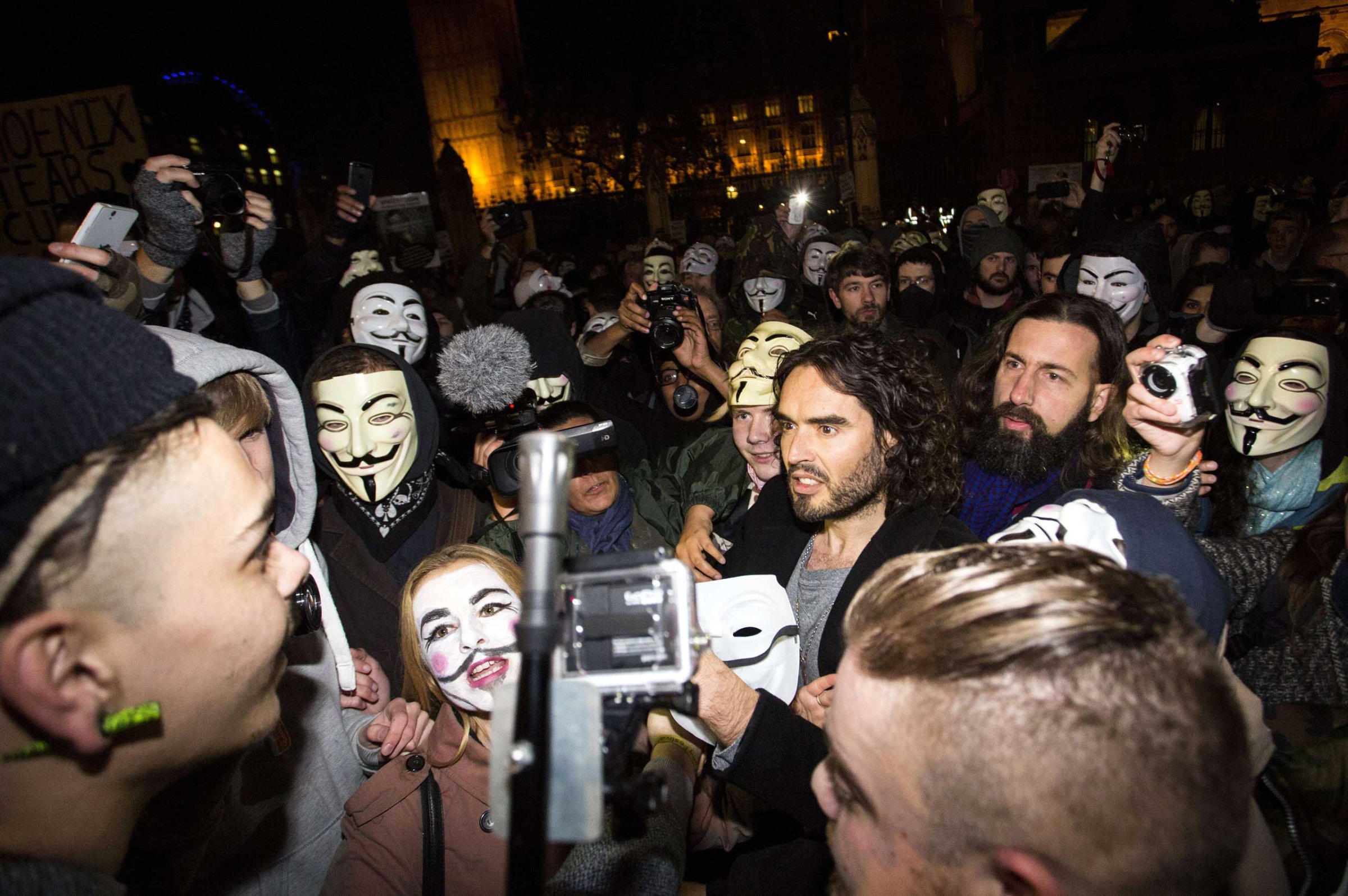 British comedian Russell Brand joins anti-capitalist protesters during the "Million Masks March" in London on Nov. 5, 2014.