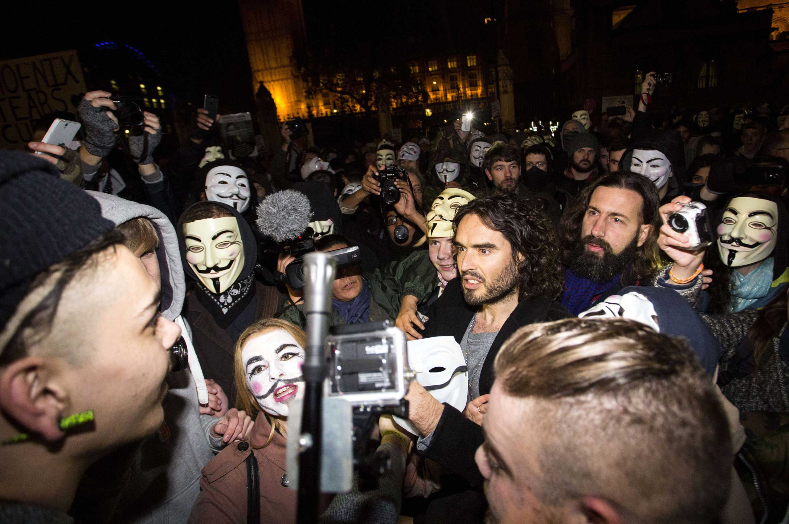British comedian Russell Brand joins anti-capitalist protesters during the "Million Masks March" in London on Nov. 5, 2014. (Jack Taylor—AFP/Getty Images)
