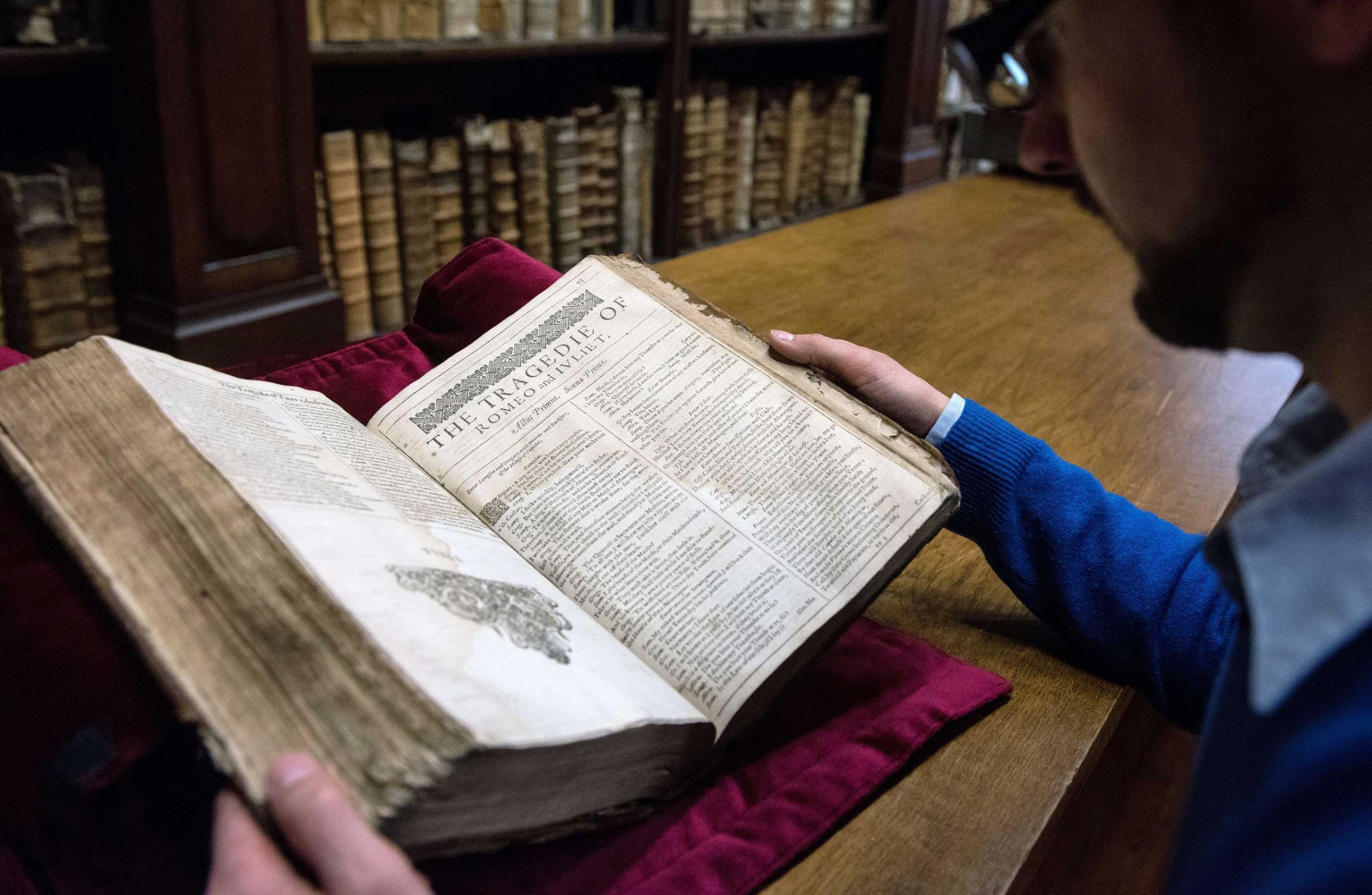 Remy Cordonnier, librarian in the northern town of Saint-Omer, near Calais carefully shows an example of a valuable Shakespeare "First Folio", a collection of some of his plays, dating from 1623.