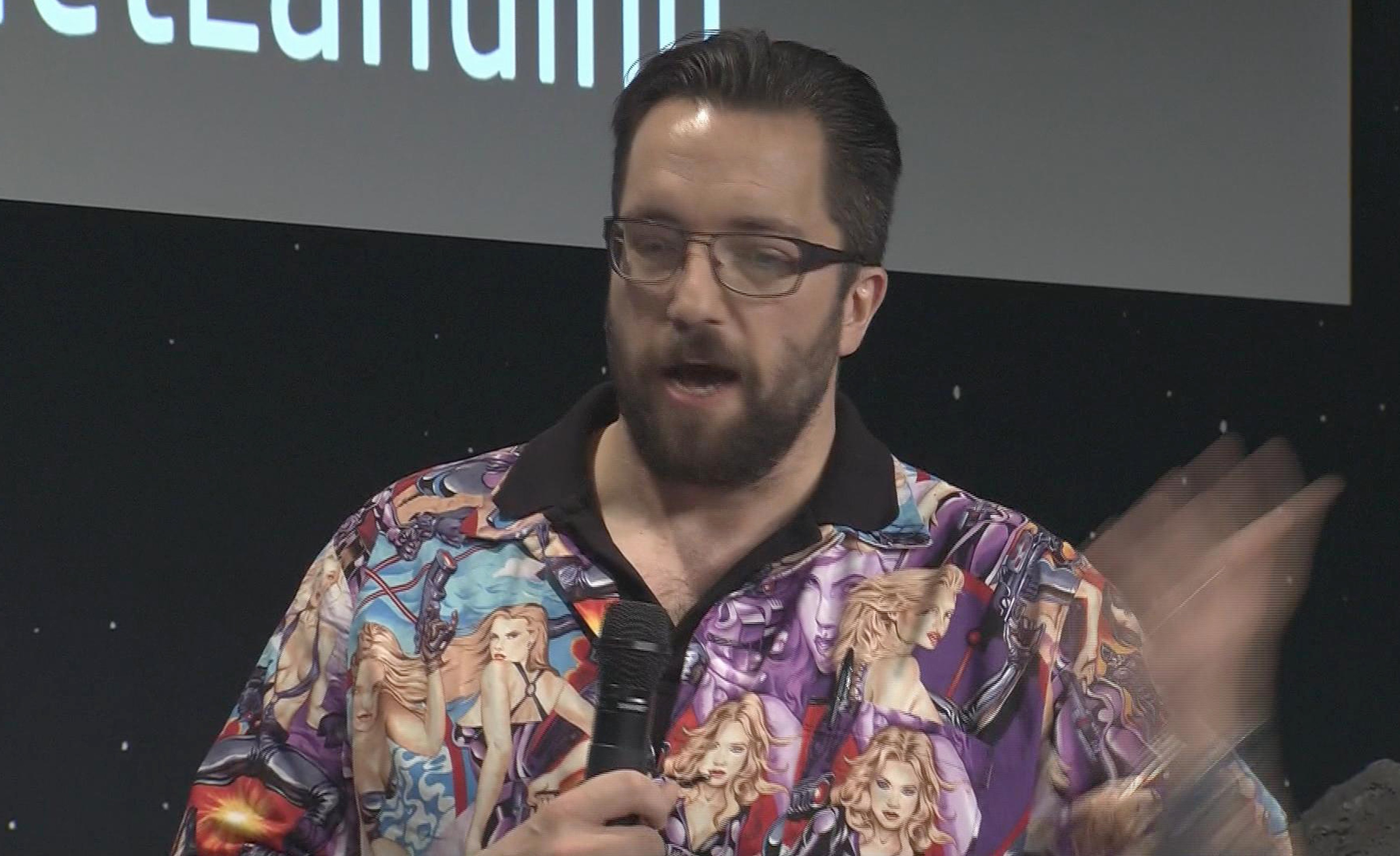 British physicist Matt Taylor sporting a garish shirt featuring a collage of pin-up girls during an interview at the satellite control centre of the European Space Agency in Darmstadt, Germany on Nov. 13, 2014. (AP)