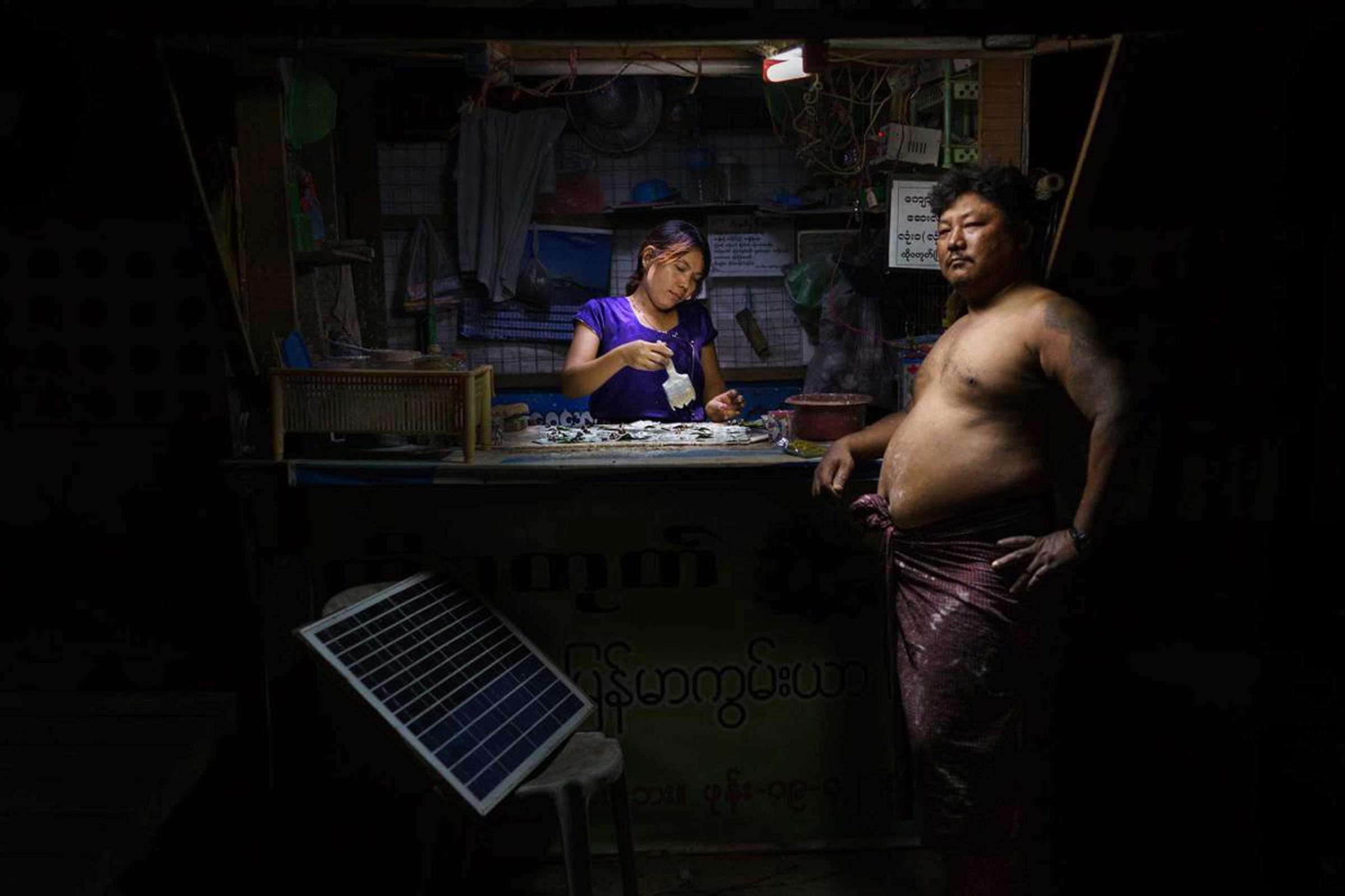 Nyi Min Htut (46) & Cho Cho Win (40) are married and own a bettle-nut shop powered by solar light. Minglar Don Township, 20 km north of Yangon.