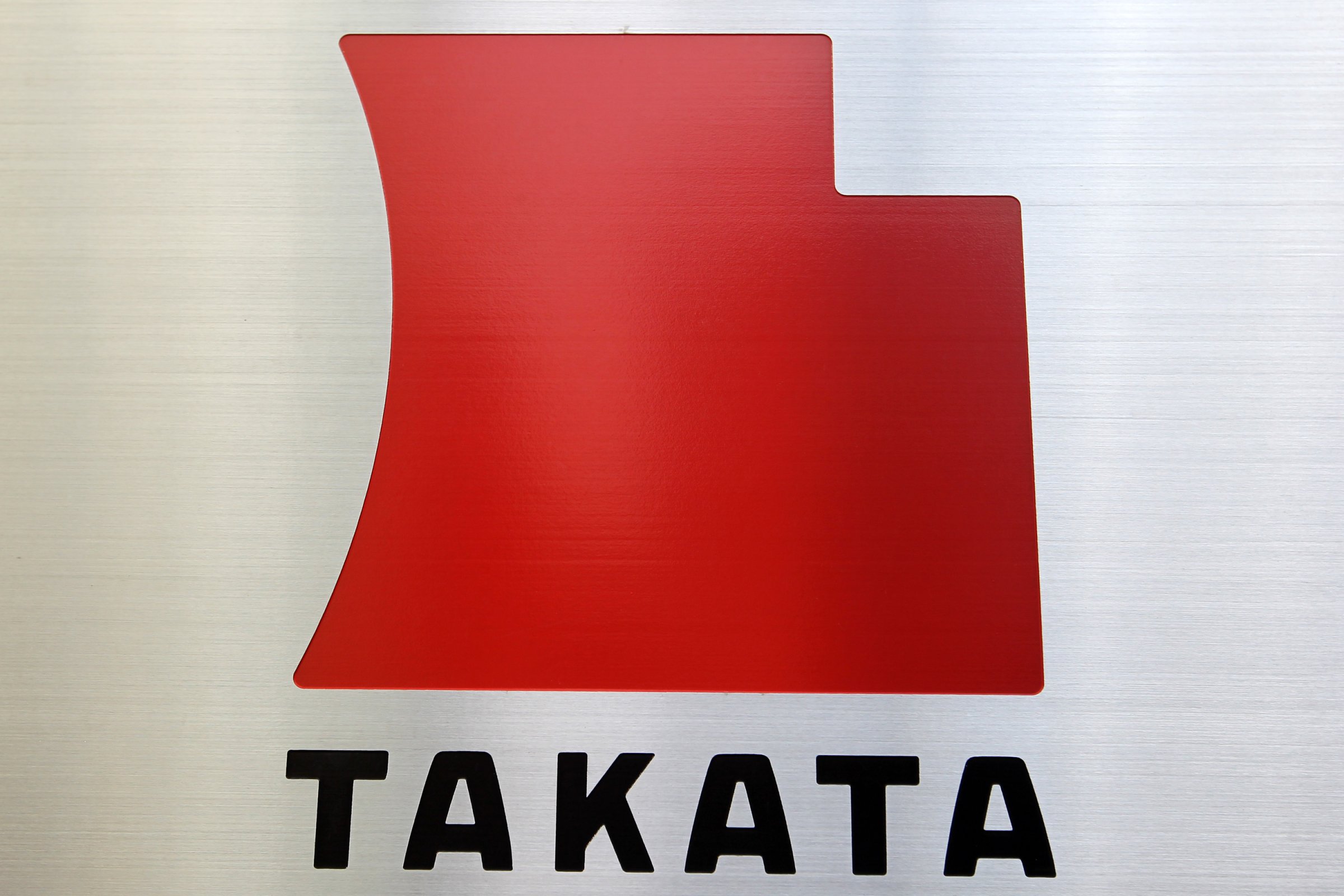 The Takata Corp. logo is displayed outside the company's headquarters in Tokyo.