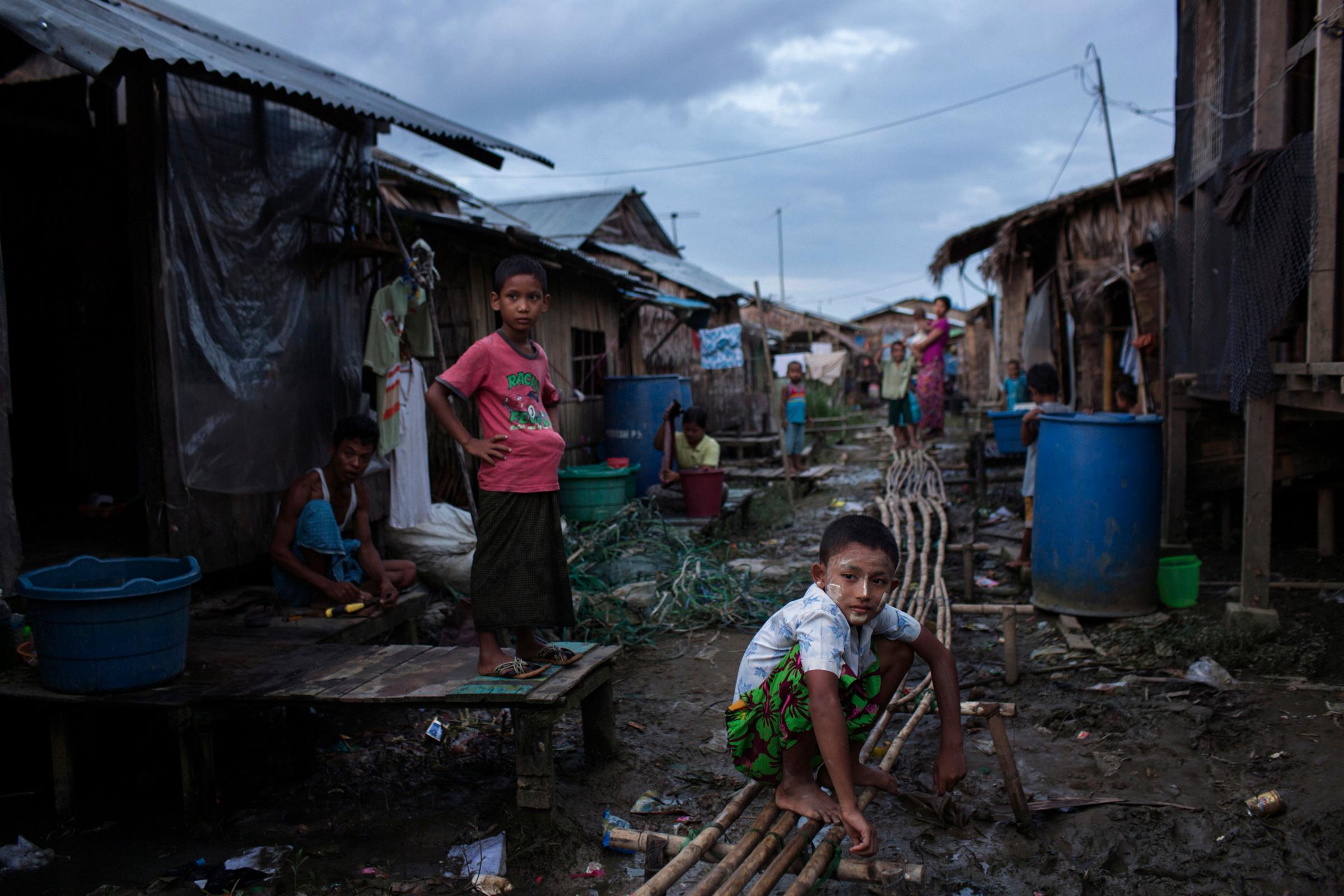 Children are seen in Daw Pon,  near Thilawa Special Economic Zone  near Yangon, Burma, Sept. 20, 2014.
