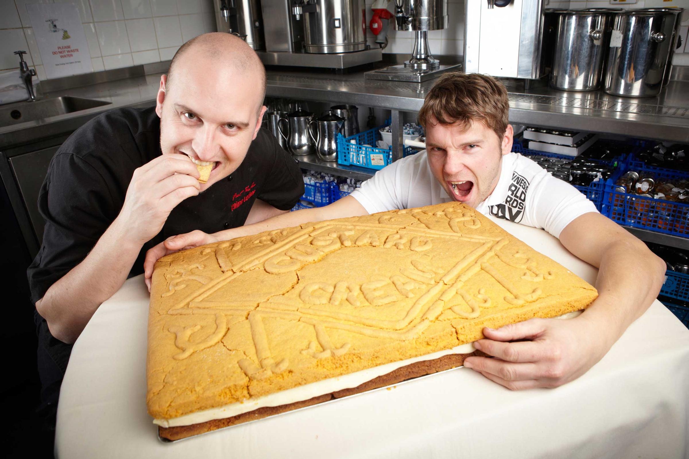 The largest (Custard) Cream Biscuit is 59 cm long and 39cm wide completely edible achieved by Simon Morgan & Paul Thacker raising money for Children in Need achieved on 18 November 2010 on Guinness World Records Day. Photo Credit: Paul Michael Hughes/Guinness World Records
