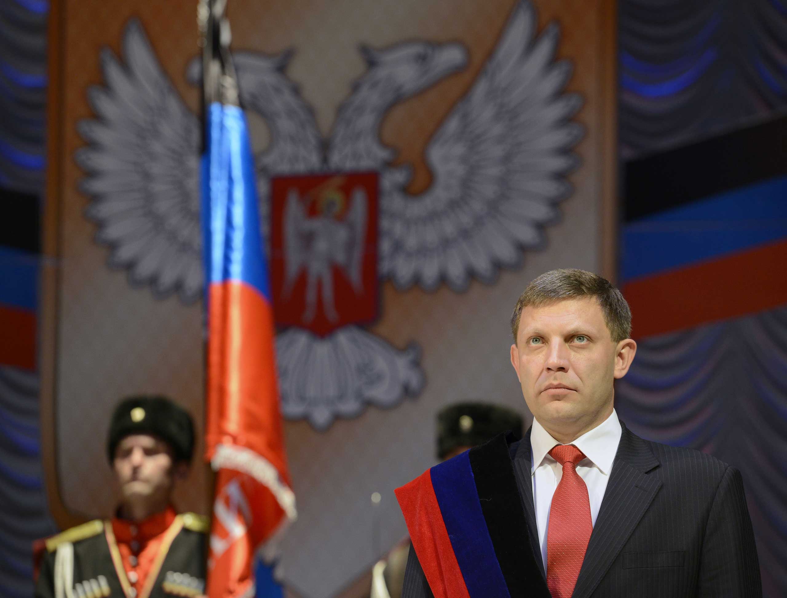 The newly elected leader of the self-proclaimed Donetsk People's Republic, Alexander Zakharchenko,  takes the oath on Nov. 4, 2014, during an inauguration ceremony in the eastern Ukrainian city of Donetsk (Alexander Khudoteply—AFP/Getty Images)