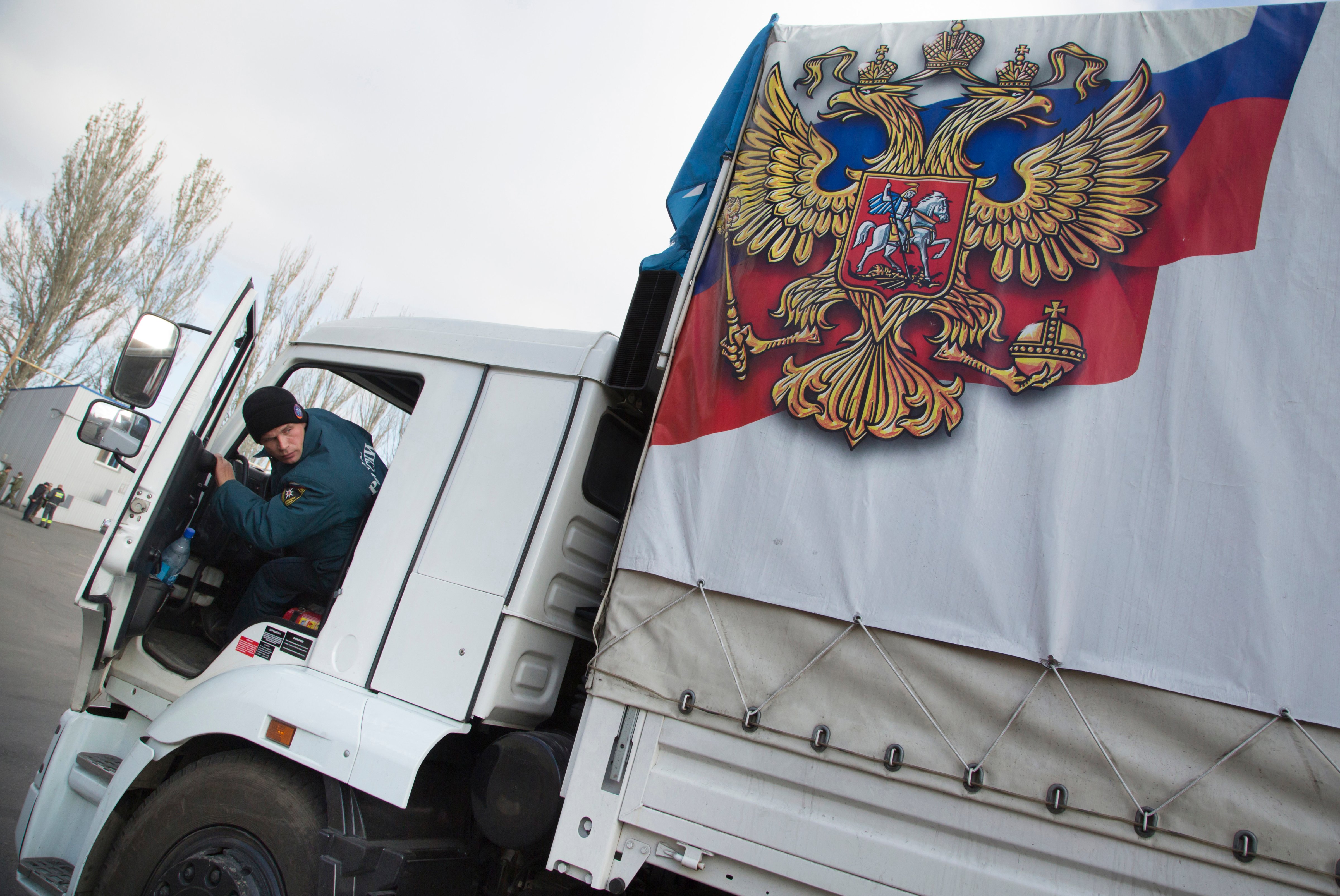 A driver parks a truck of a Russian humanitarian-aid convoy at a warehouse in the city of Donetsk, eastern Ukraine, on Oct. 31, 2014 (Dmitry Lovetsky—AP)