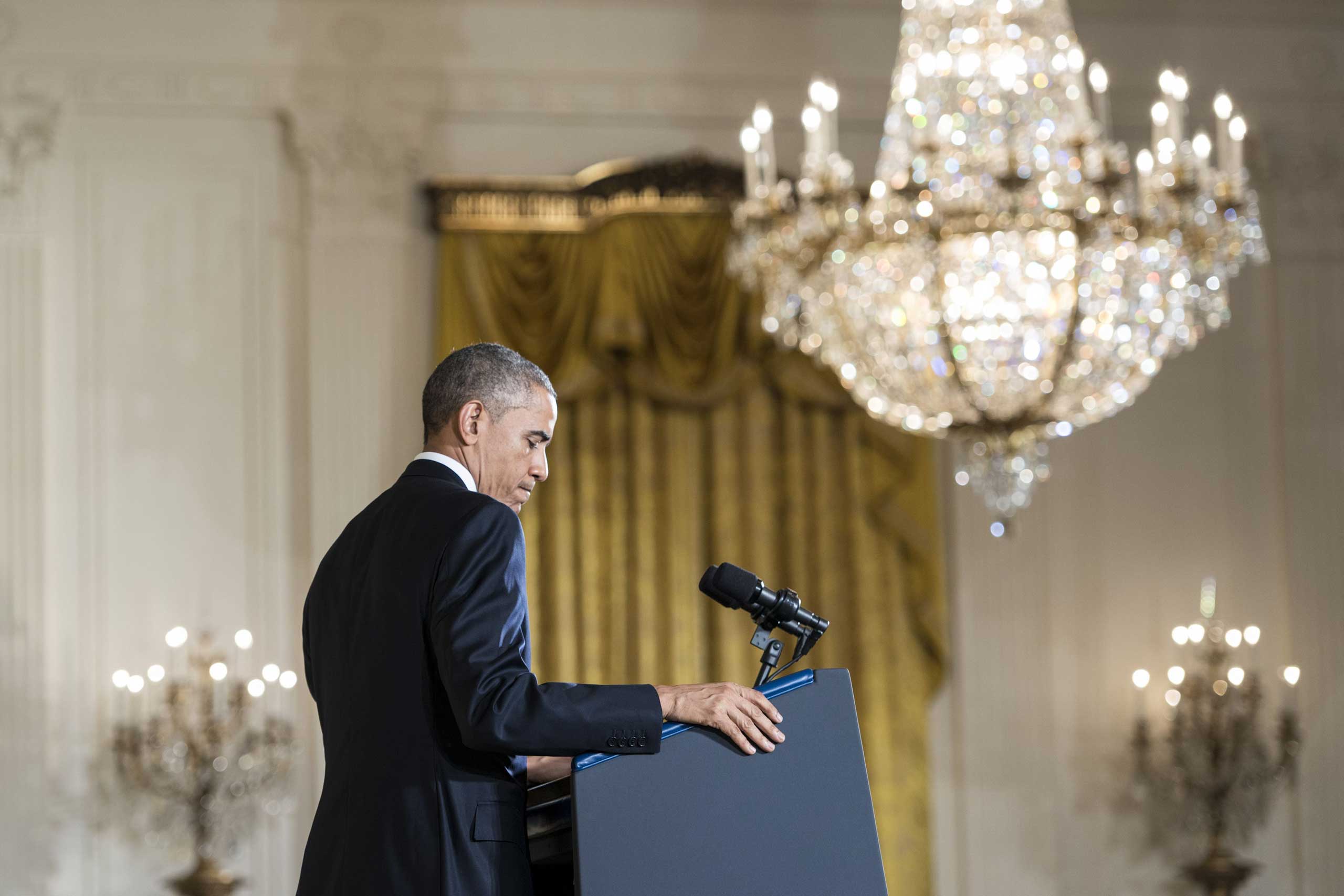 President Barack Obama pauses while speaking during a press conference in the East Room of the White House in Washington on Nov. 5, 2014. (Brendan Smialowski—AFP/Getty Images)