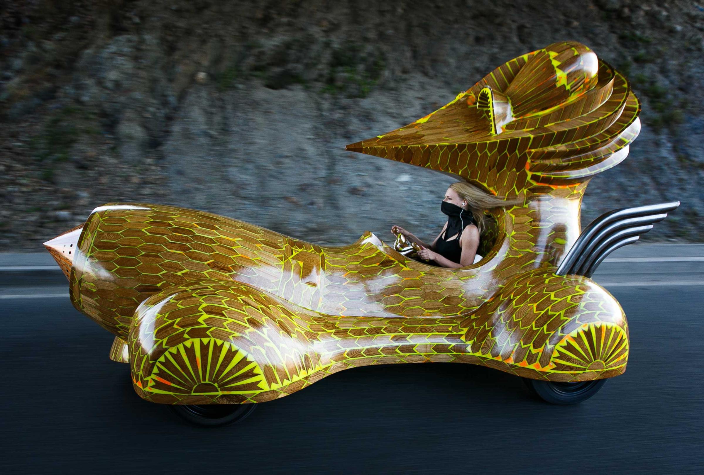 A president-mobil concept car, designed by Georgy Ostretsov, is given a test run across the Zolotoi Rog (Golden Horn) Bay on Oct. 3, 2014. The car's engine is powered by ethanol biofuel.