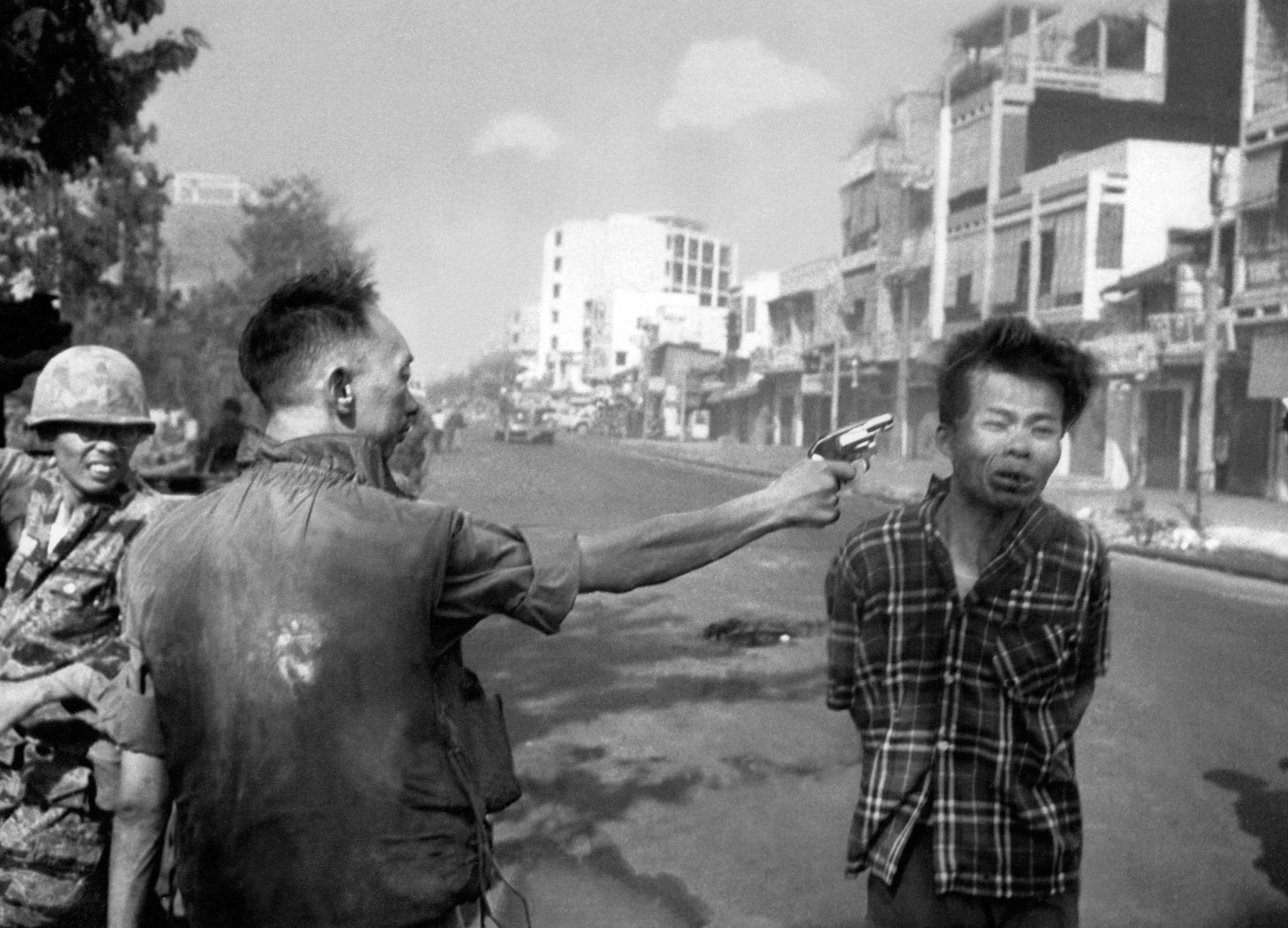 South Vietnamese Gen. Nguyen Ngoc Loan, chief of the national police, fires his pistol and executes suspected Viet Cong officer Nguyen Van Lem in Saigon on Feb. 1, 1968.