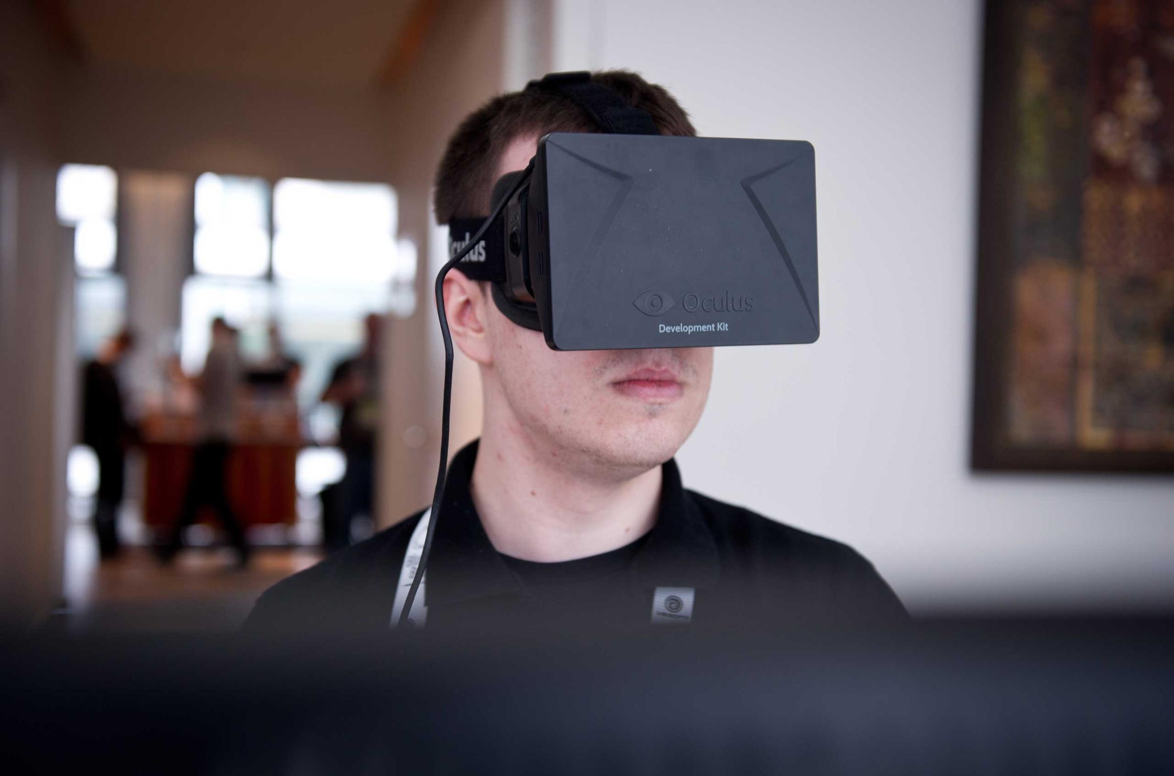 A man played a game with the virtual reality head-mounted display 'Oculus Rift' at International Games Week in Berlin. The display transfers the eye movements to the game in real time.