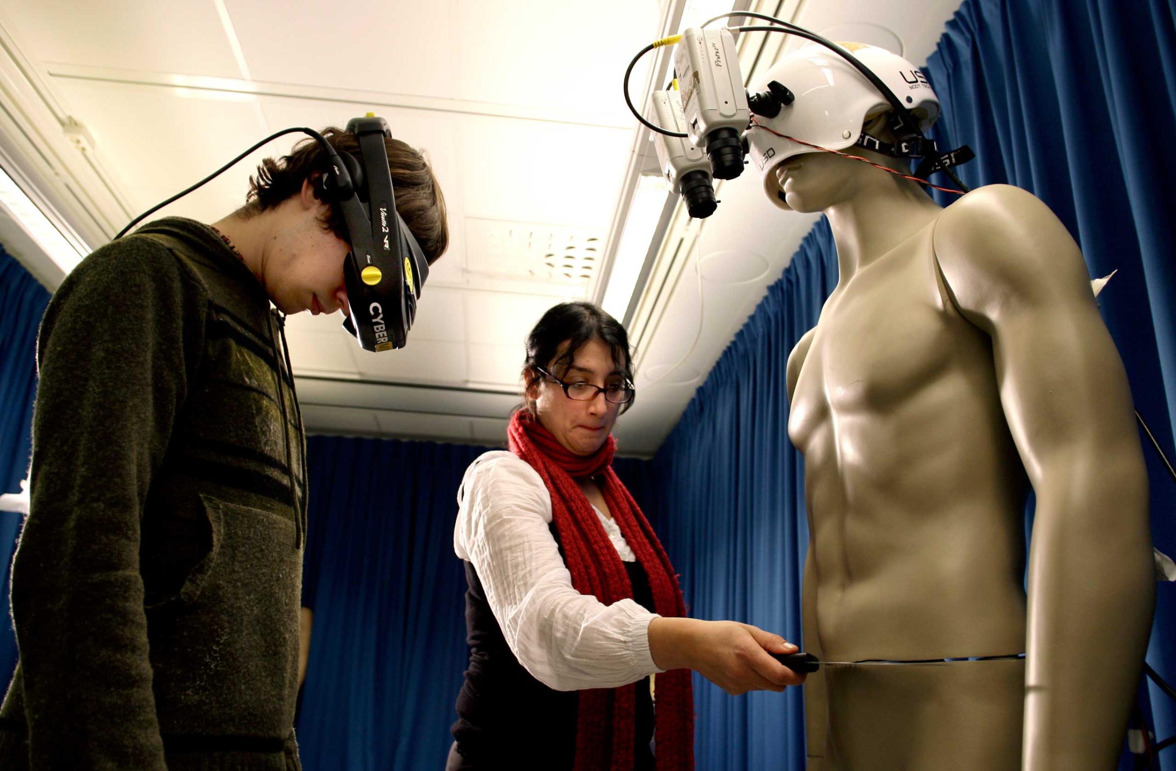 Valeria Petkova, right, and student Andrew Ketterer, left, of the Karolinska Institute in Stockholm, tested the 'body-swap' illusion, a method whereby people can experience the illusion that either a mannequin or another person's body is their own body.