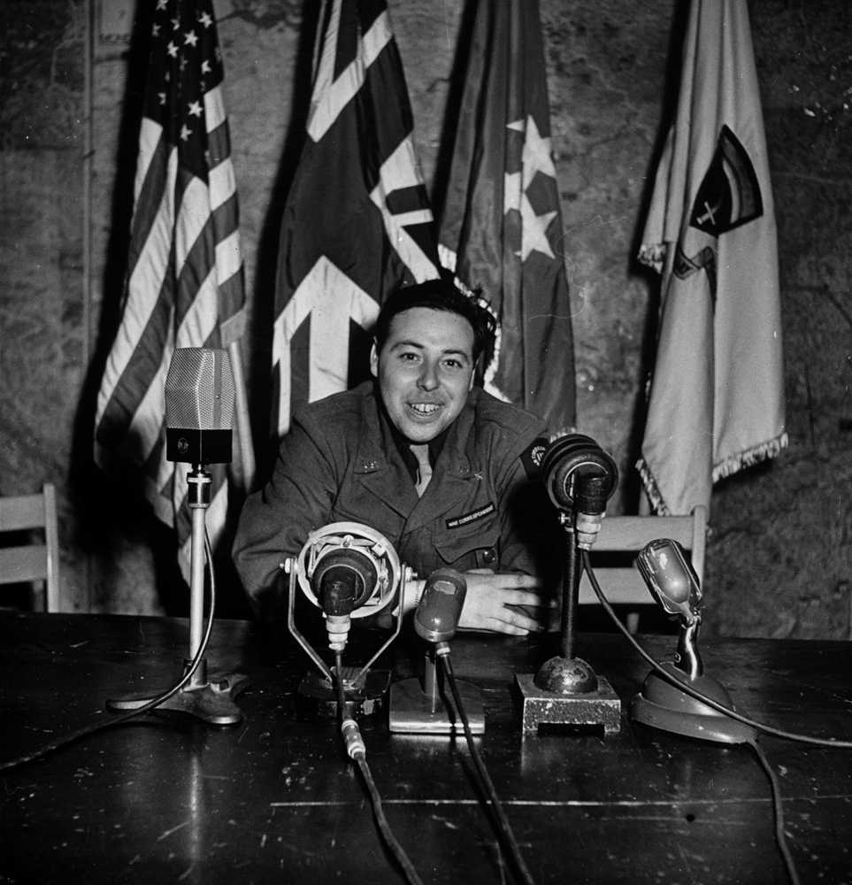LIFE photographer/war correspondent Ralph Morse posing for his own surrender-day memento in the same chair from which General Eisenhower announced Allied victory in Europe, May 1945.