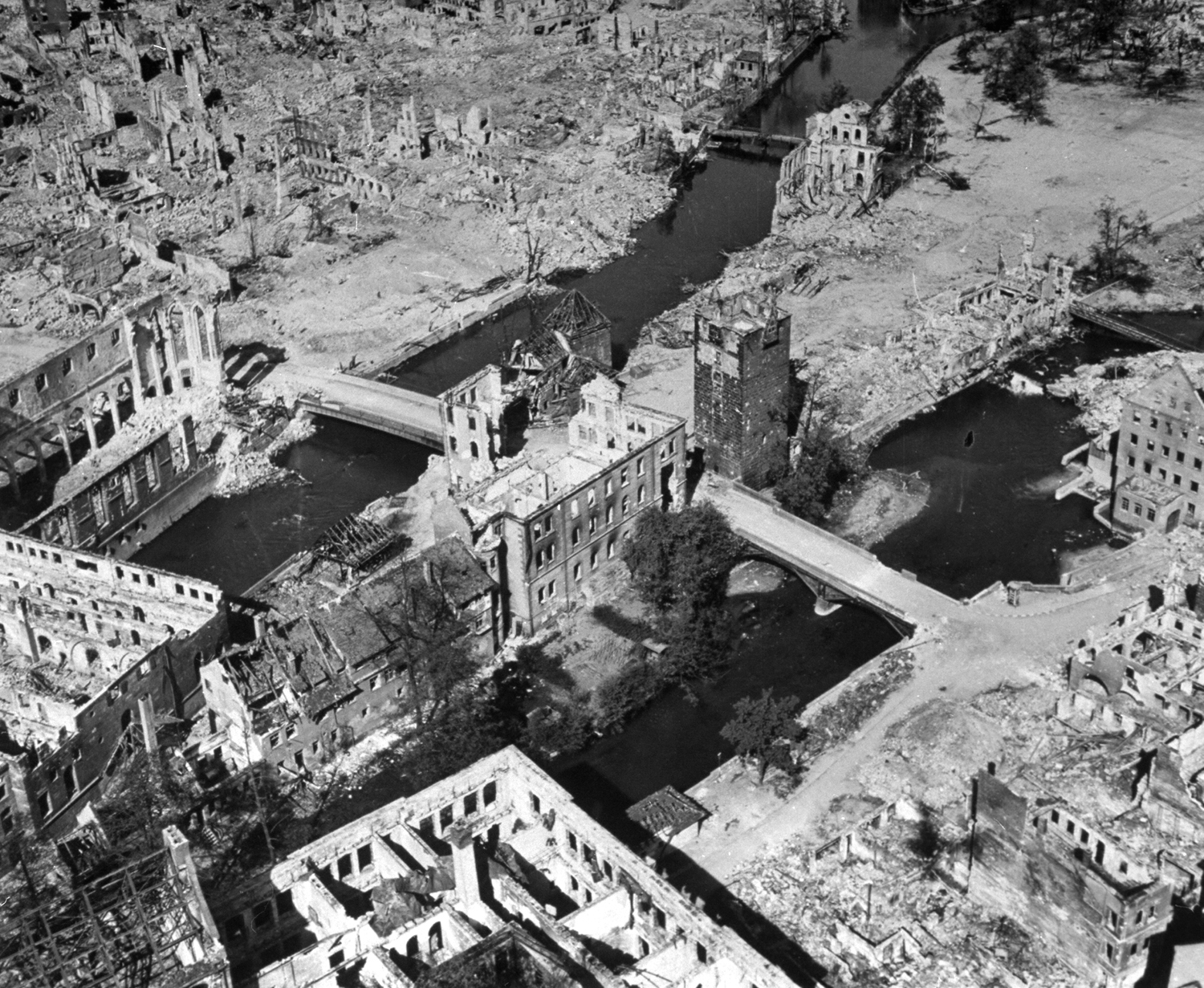 On June 2, 1945, RAF night raid of tremendous proportions wrecked key objectives in the center of the city (Nuremberg), leaving skeletal walls and leveled areas pictured.