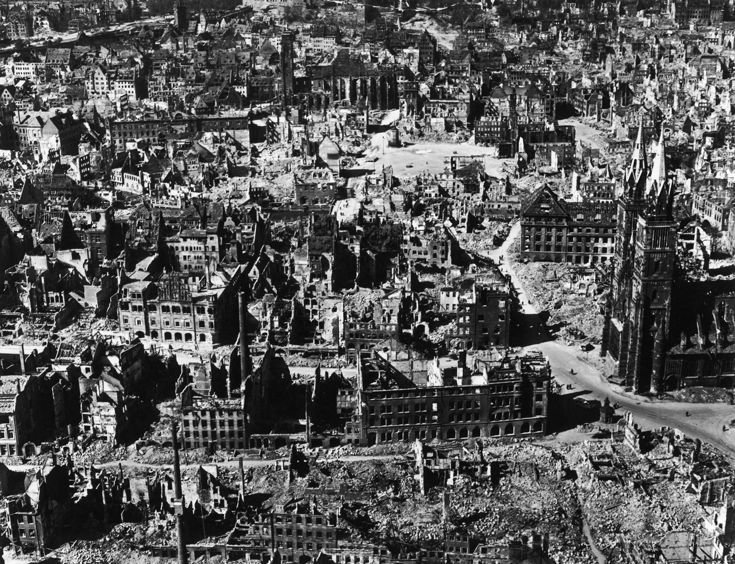 Aerial view of bomb-damaged buildings after an Allied air attack on Nuremberg, Germany, 1945.