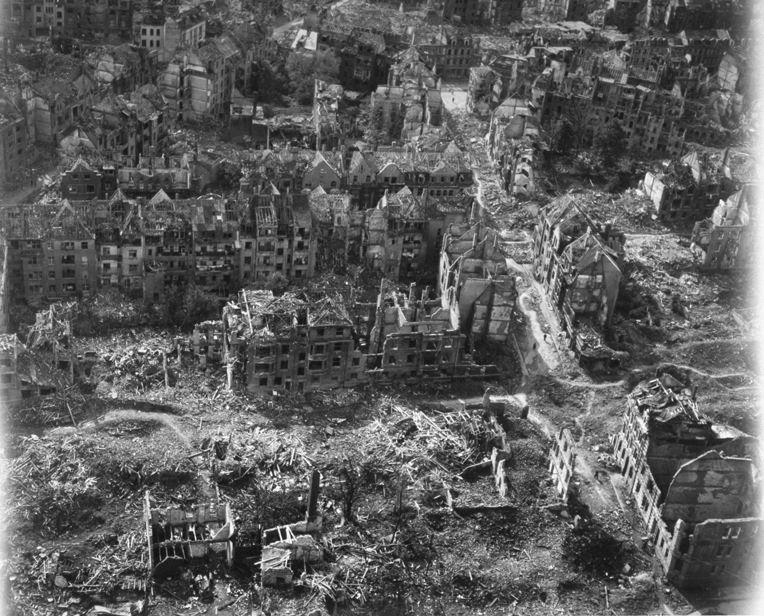 Aerial view of bomb-damaged residential areas, Essen, Germany, 1945.