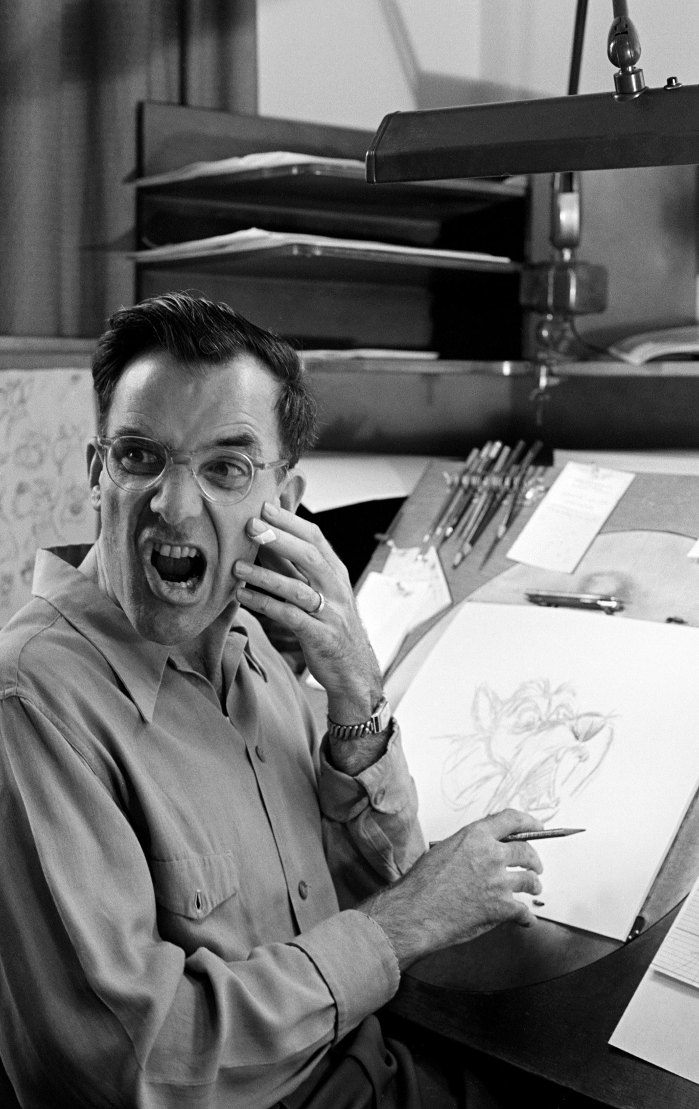 A Disney animator and a character he's drawn.
