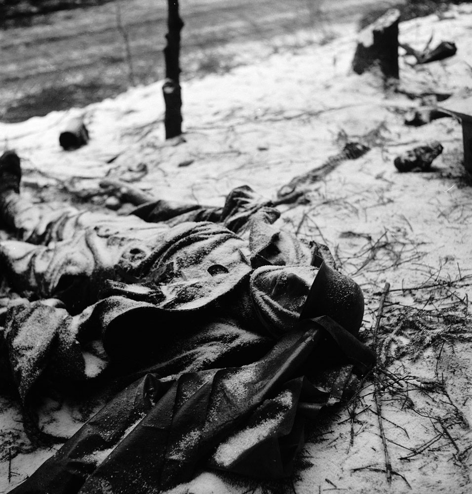 Frozen corpse of a German soldier killed during the Battle of the Bulge.