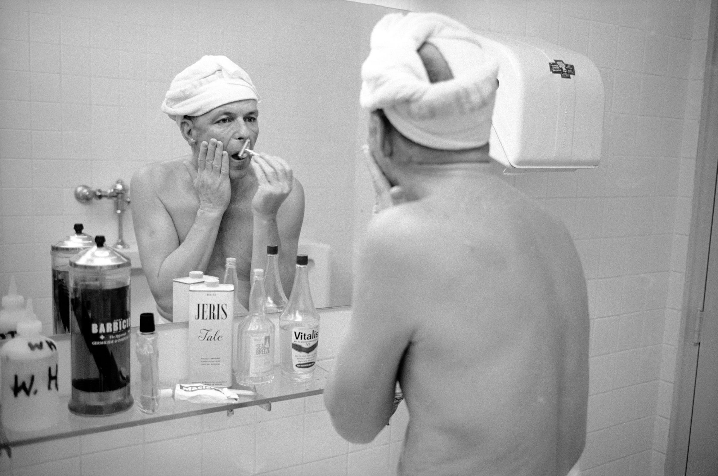 Frank Sinatra shaving, 1965.