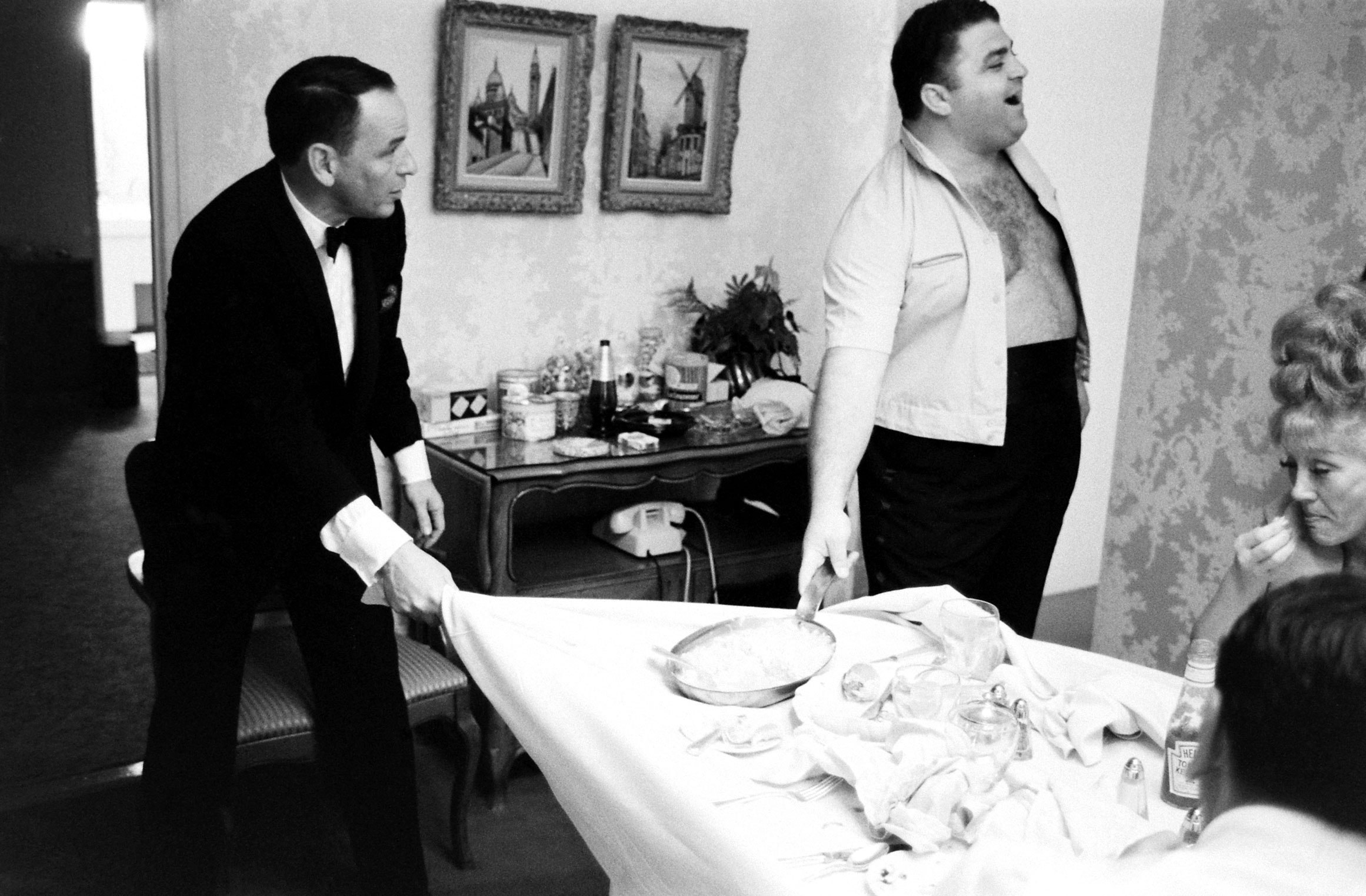 In Miami, where he appeared with Joe E. Lewis for two weeks this year, Sinatra ... tells his bodyguard, Ed Pucci, that he will clear the table by yanking the cloth off without disturbing the china.