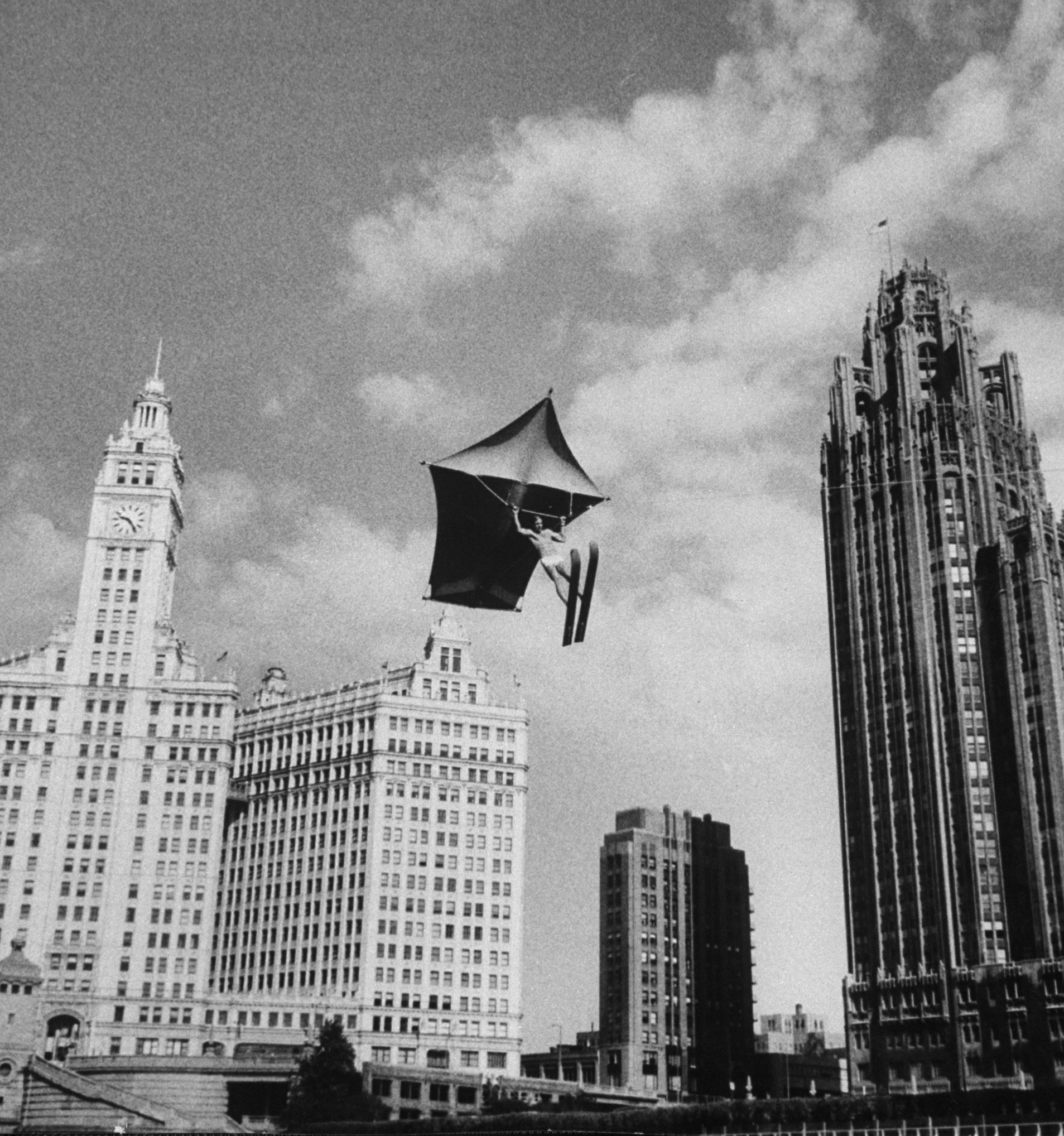 Stunt man Jack Wylie soars over the Chicago River, 1958.