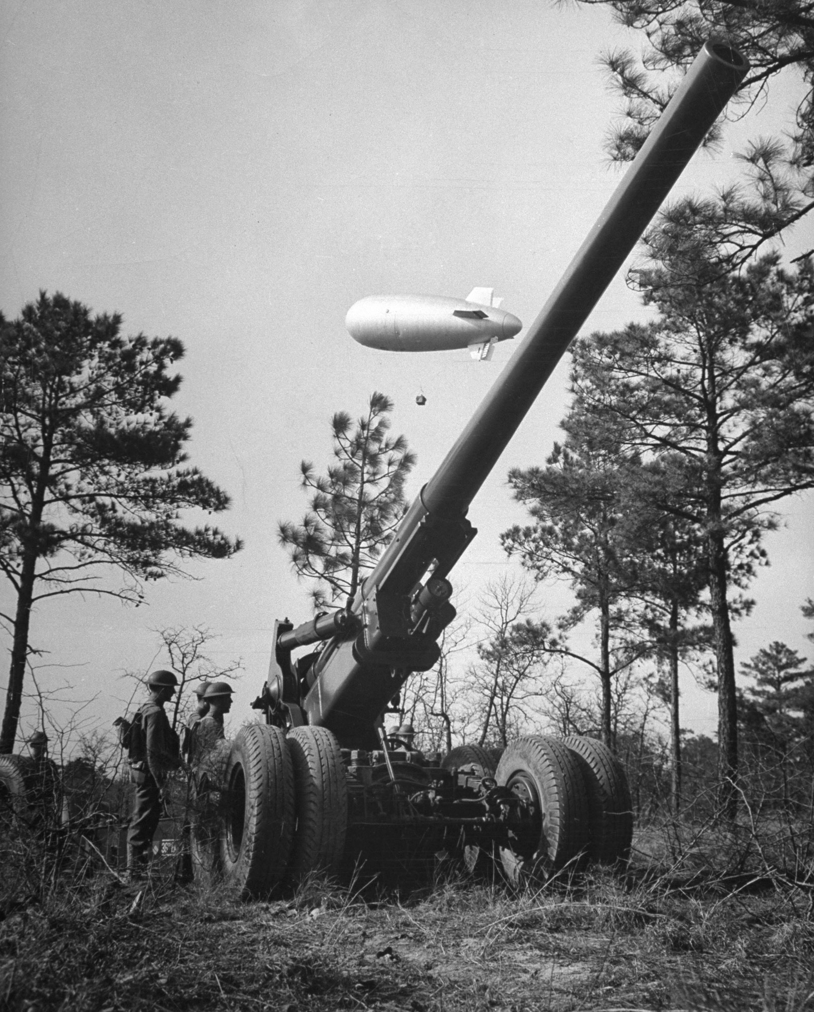 An observation balloon spotting for a 155mm gun at Fort Bragg, 1940.
