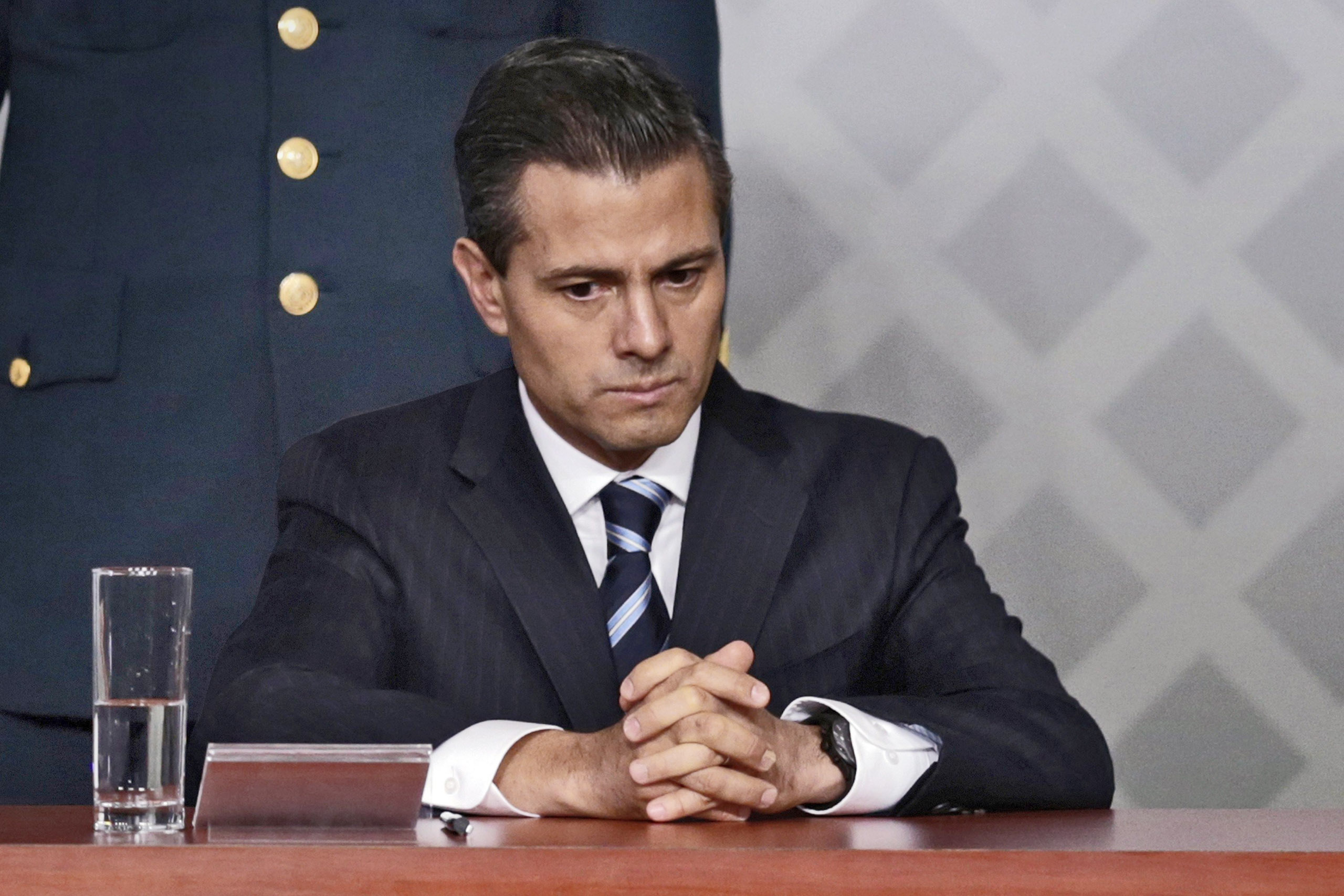 Mexico's President Enrique Pena Nieto sits during a meeting with lawyers in Mexico City