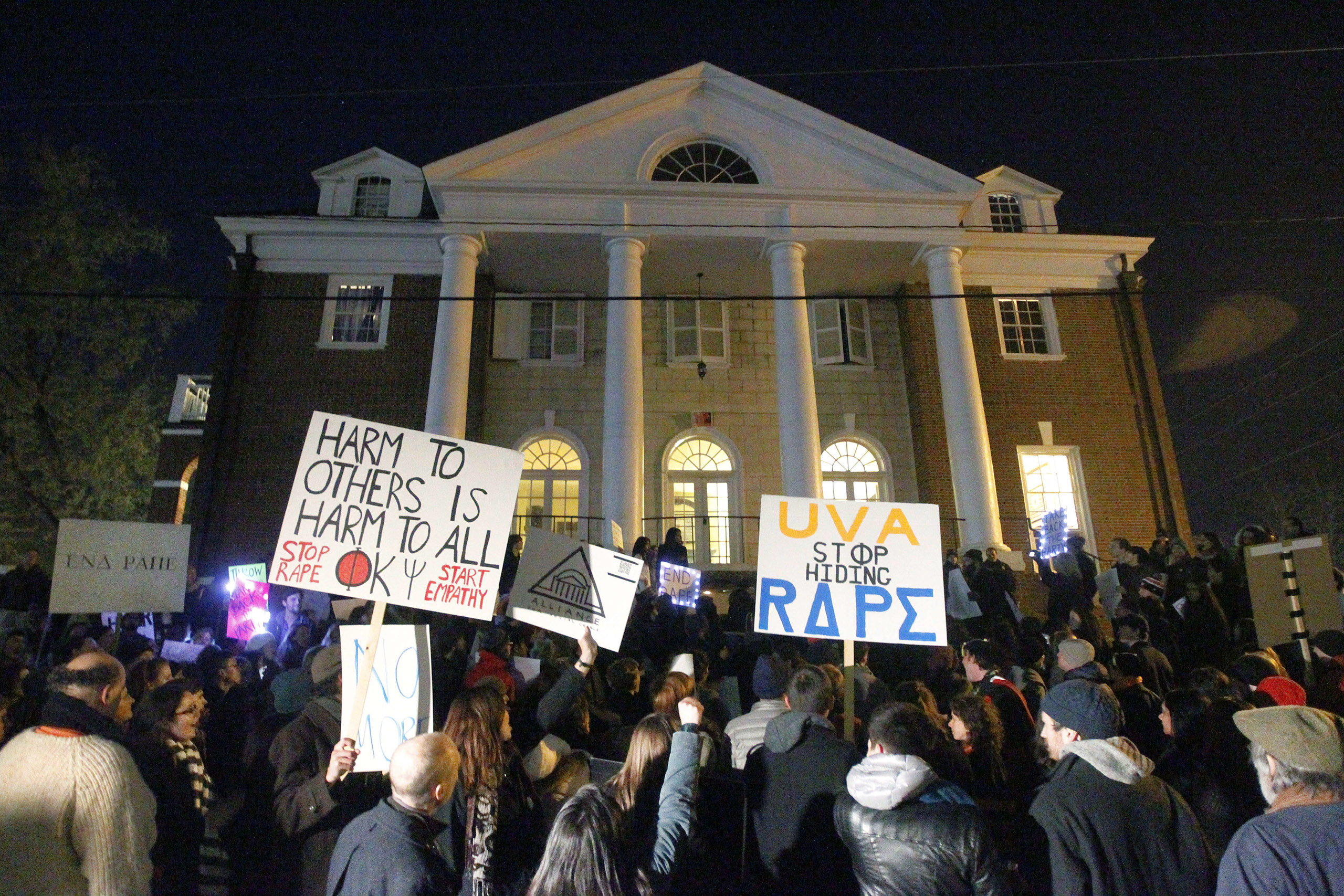 Protesters gather in front of the Phi Kappa Psi fraternity house at the University of Virginia on Nov. 22 (Ryan M. Kelly—AP)