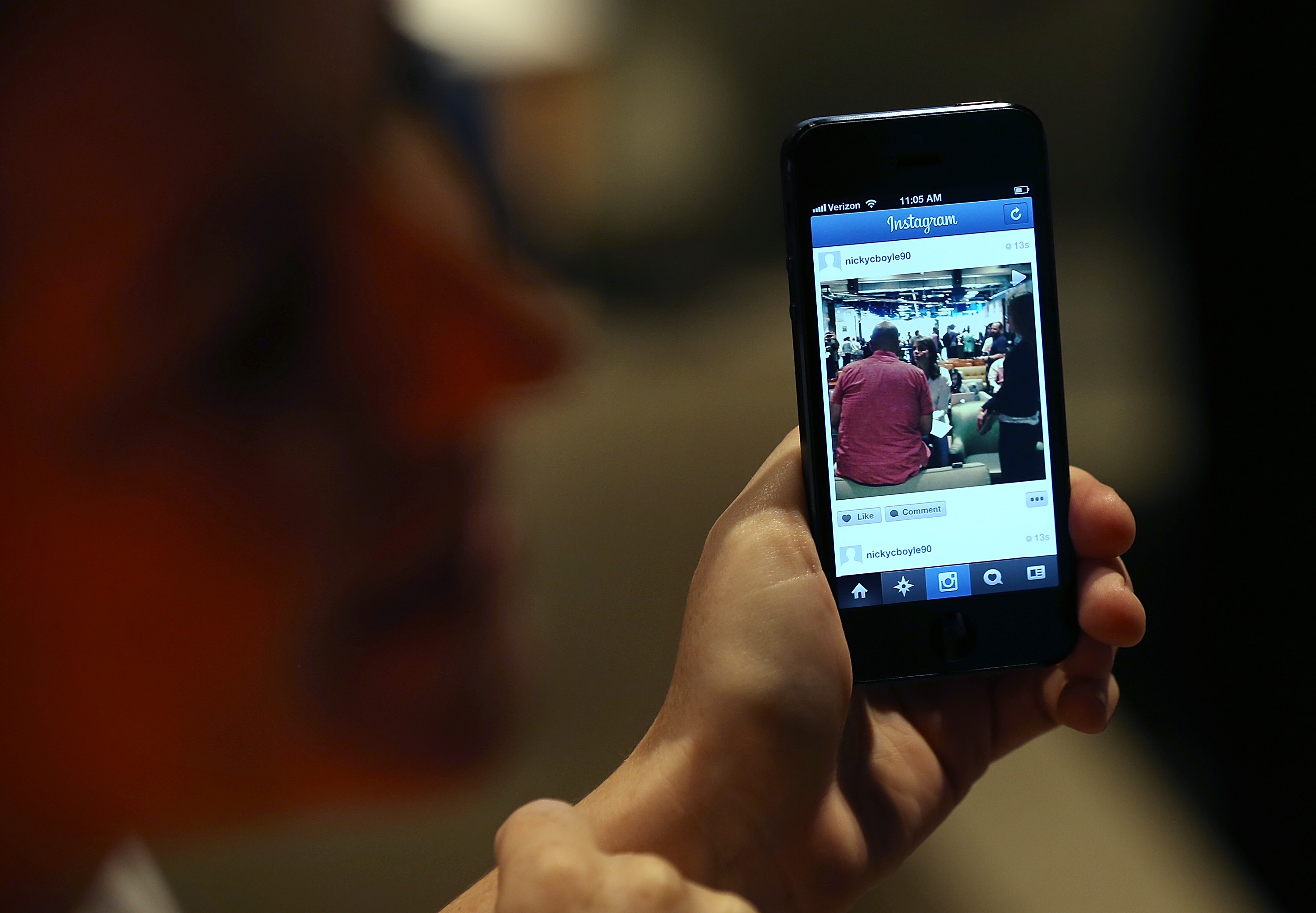 A Facebook employee demonstrates the new Instagram video option during a press event at Facebook headquarters on June 20, 2013 in Menlo Park, California. (Justin Sullivan—Getty Images)