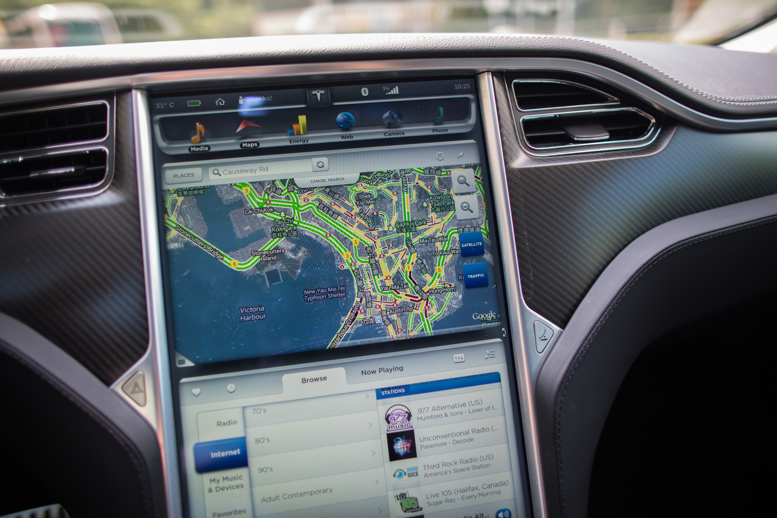 A Google Inc. map is displayed on a screen in a Tesla Motors Inc. Model S sedan electric vehicle (EV) parked in the area of Cyberport in Hong Kong, China, on Friday, July 5, 2013. (Bloomberg&mdash;Bloomberg via Getty Images)