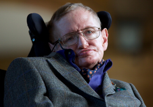 Theoretical physicist Stephen Hawking poses for a picture ahead of a gala screening of the documentary 'Hawking', a film about the scientist's life.