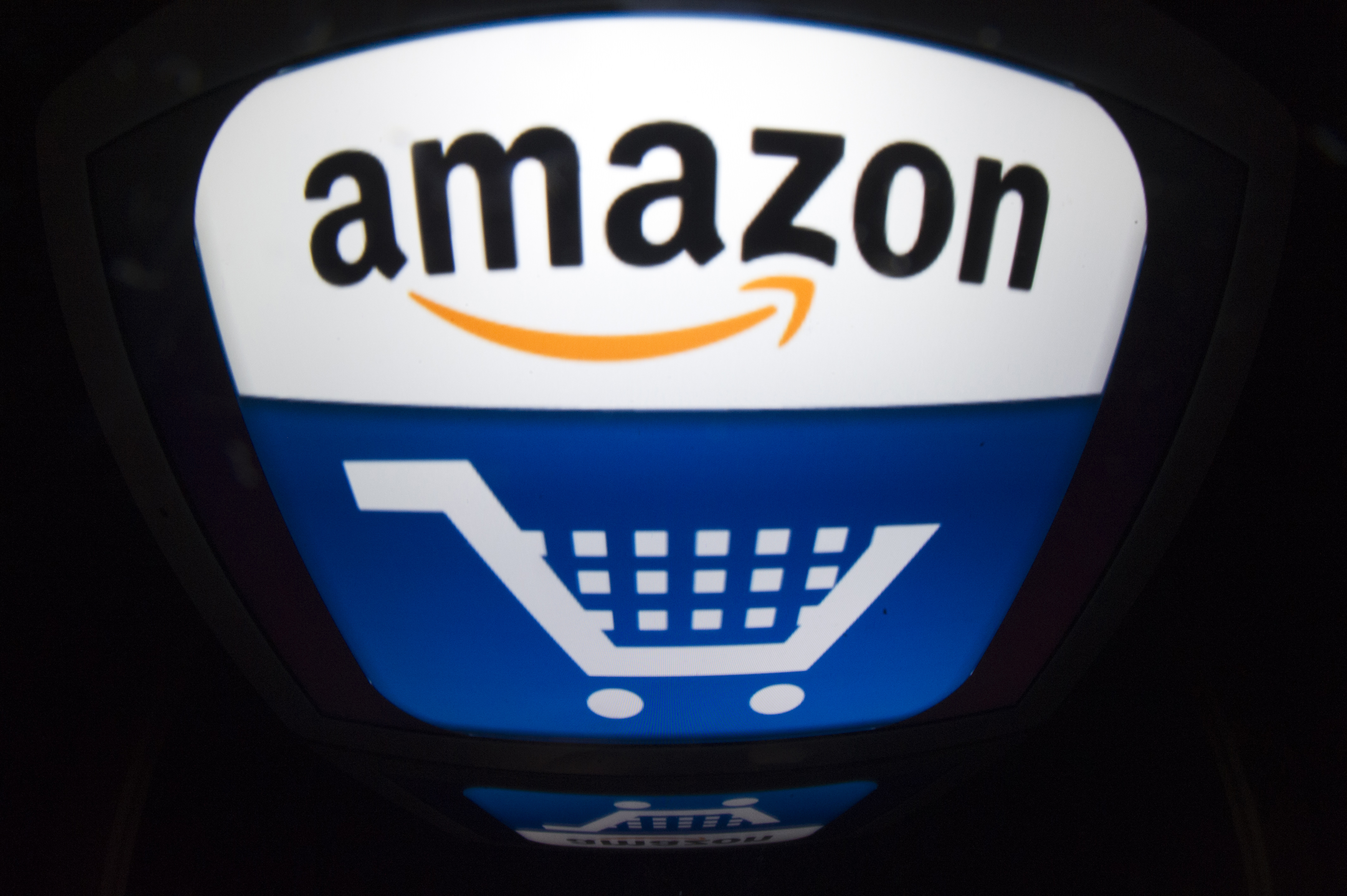 The Amazon logo is shown in Paris on November 13, 2012. (LIONEL BONAVENTURE—AFP/Getty Images)