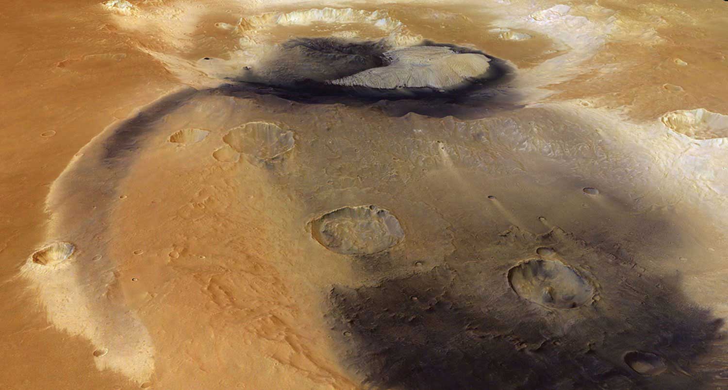 Prominent patches of wind-blown dust, possibly mixed with volcanic ash, radiate from Becquerel crater and into a neighboring crater on Mars. The streak of dust following a radial path likely traces a gentle topographic depression.