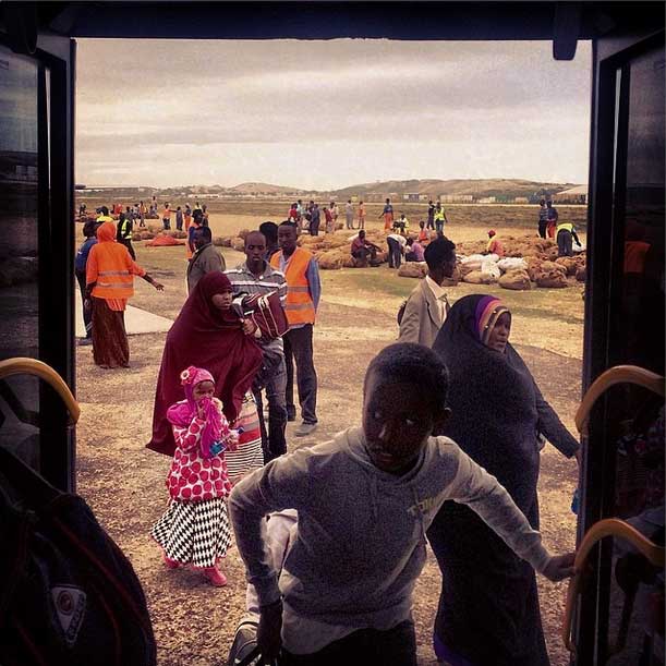 Boarding the bus, sent to greet us, on the tarmac at the airport in Mogadishu, Somalia